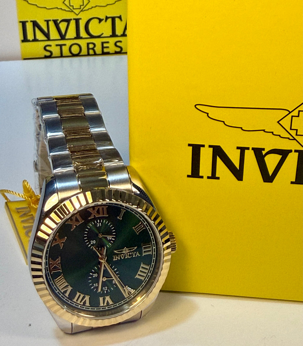Invicta Mens Specialty Belmont 43mm Silver and gold watch with green face on a yellow Invicta box