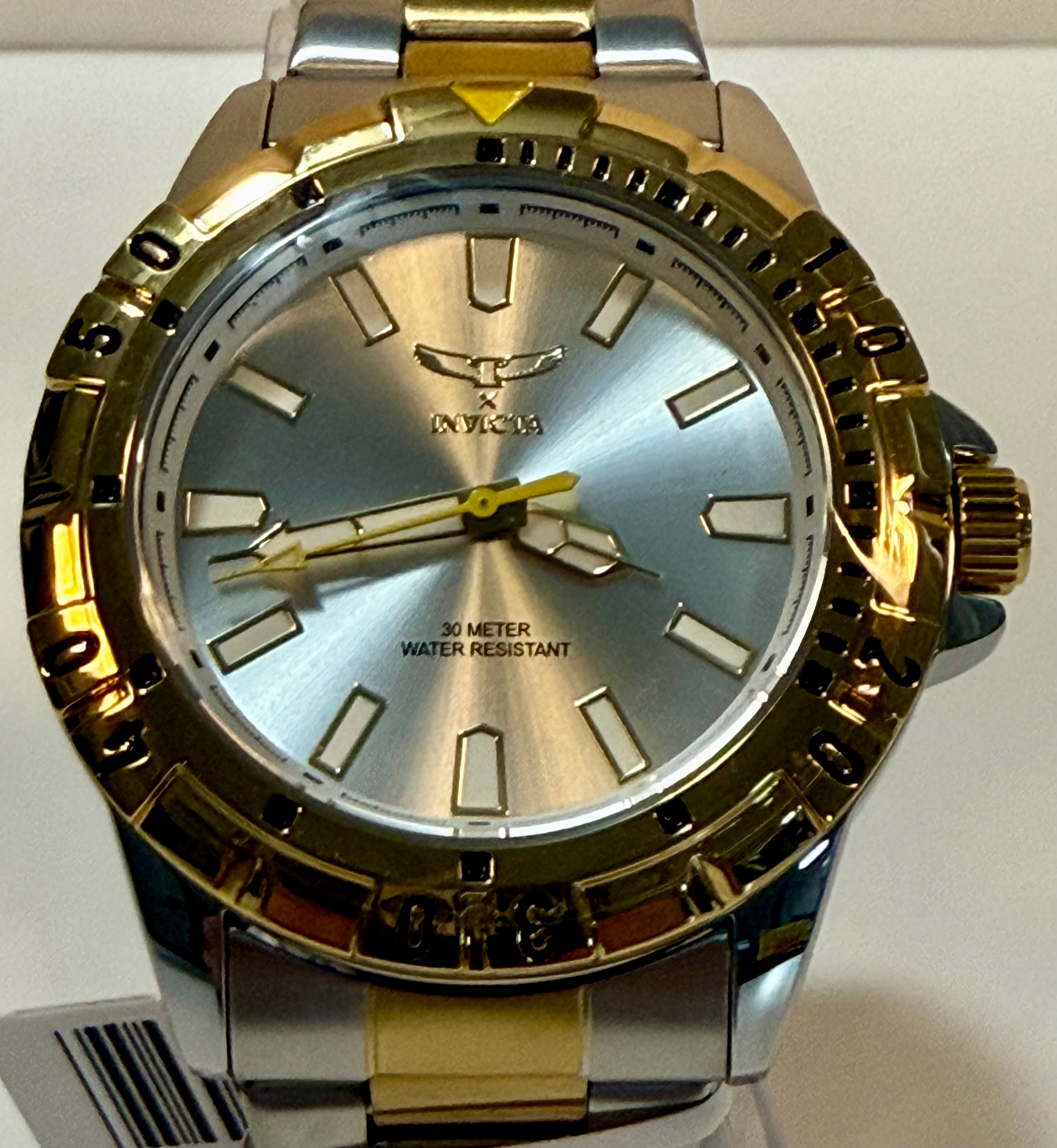 Invicta 69036 Specialty I Men 42mm Two Tone Silver Dial Quartz Bracelet Watch Gold and silver watch with a visible brand logo on a white background