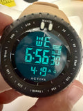 Activa X Odyssey Digital watch with compass functions held in a hand