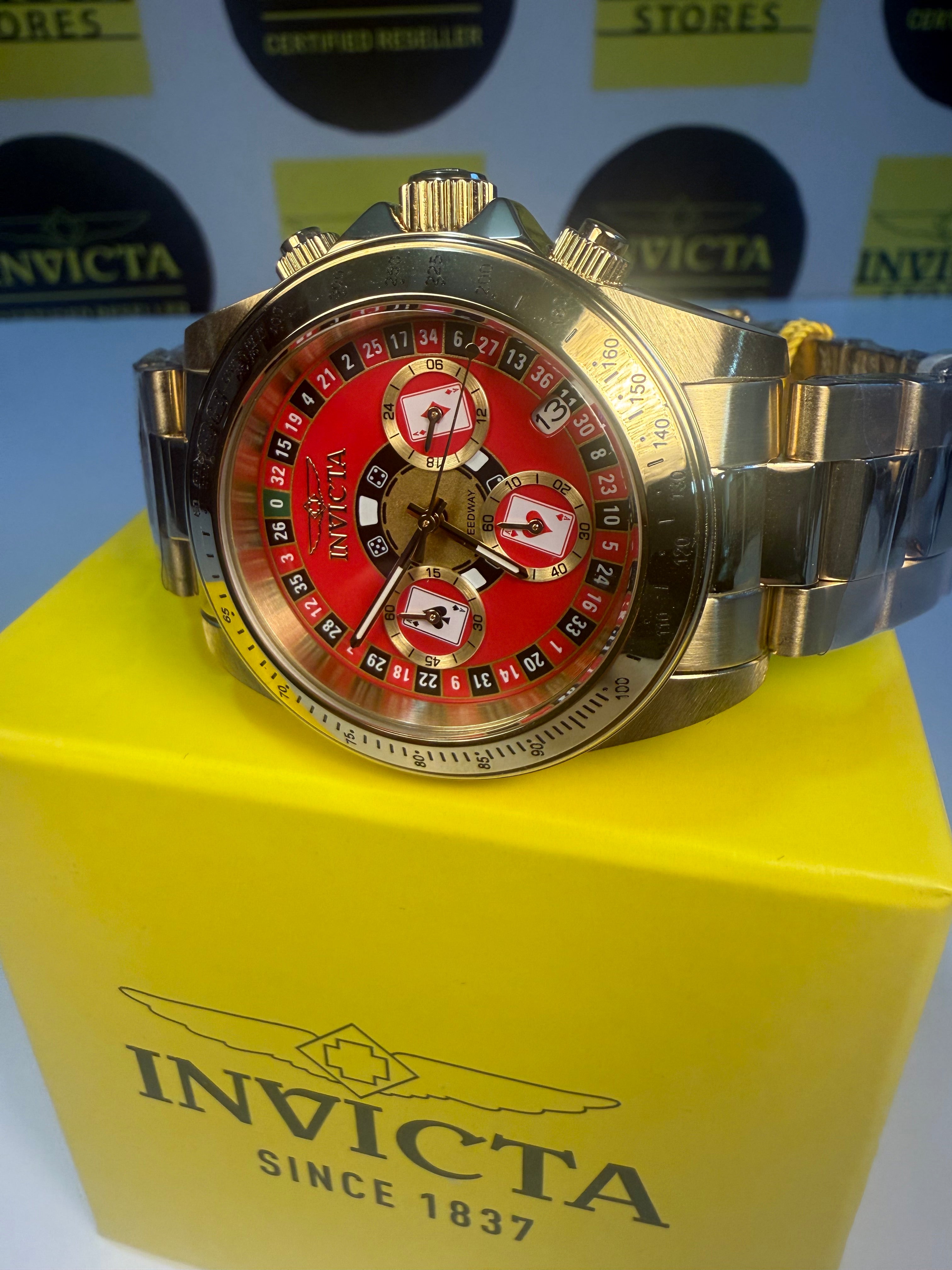 Invicta Speedway Monte Carlo Gold watch on a yellow Invicta box