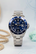 Mens 43mm Pro Diver Silver watch with black face on a white background, Invicta box visible.