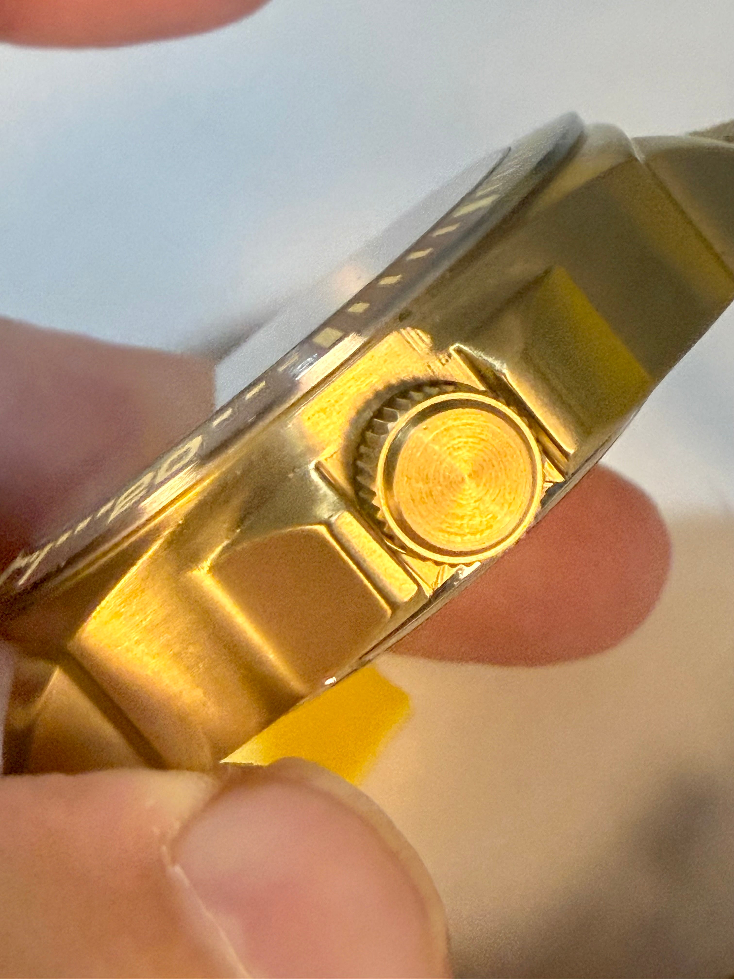 Close-up of a Invicta Speedway 48mm watch with a white background