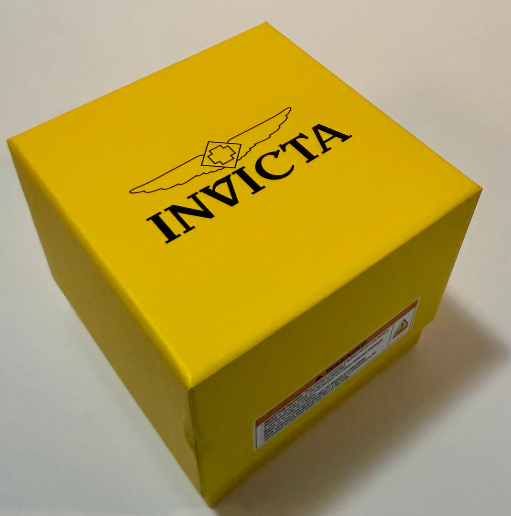 Yellow box with 'Invicta' branding on a white background