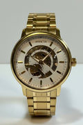 Invicta Mens Automatic Objet' De Art Gold wristwatch with a visible brand name on a white background