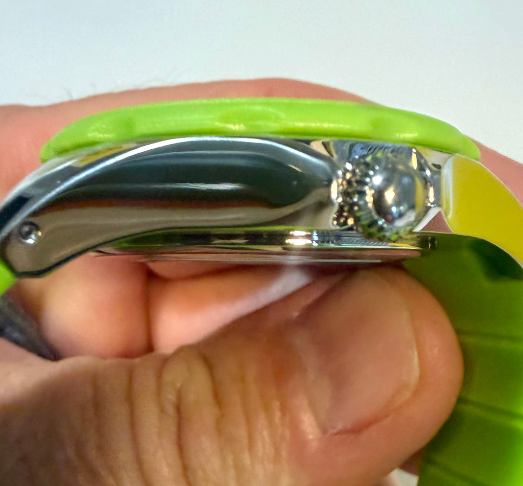 Close-up of a hand holding a Invicta Unisex 38mm Angel  against a white background