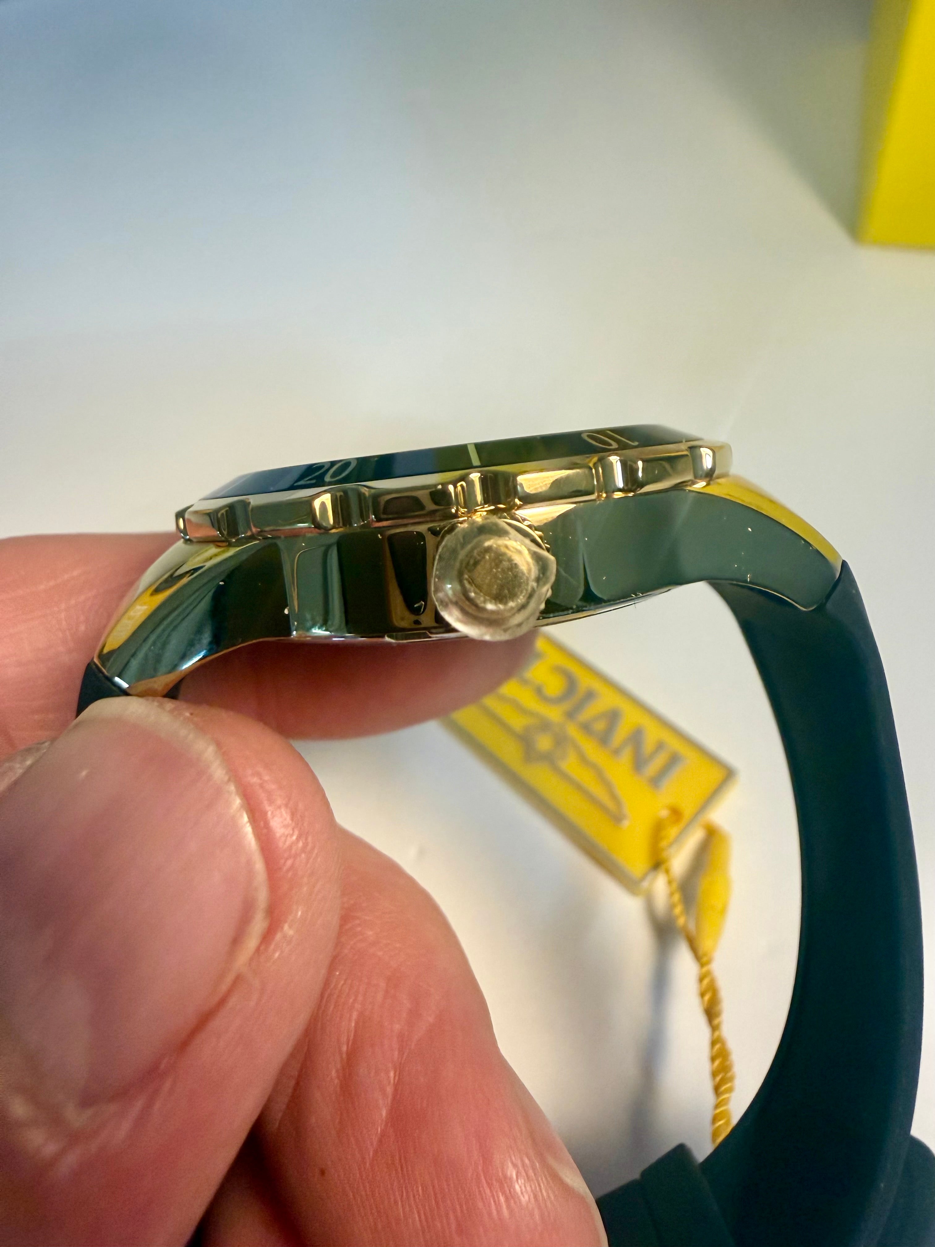 Invicta Ladies Angel Gold watch band with a visible brand tag on a white background
