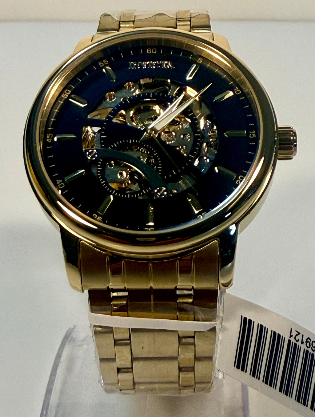 69121 Invicta Objet D Art Arcalis Automatic Men Gold Skeleton Dial Watch 42.5mm 
on a pedestal