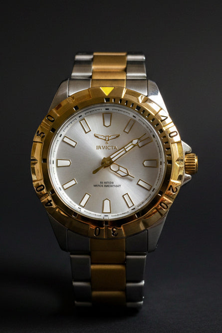 Invicta Specialty I Mens 42mm on a white surface with a visible brand name.