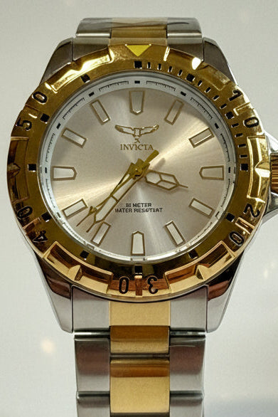 Invicta Specialty I Mens 42mm Two-tone silver and gold Invicta watch on a white background