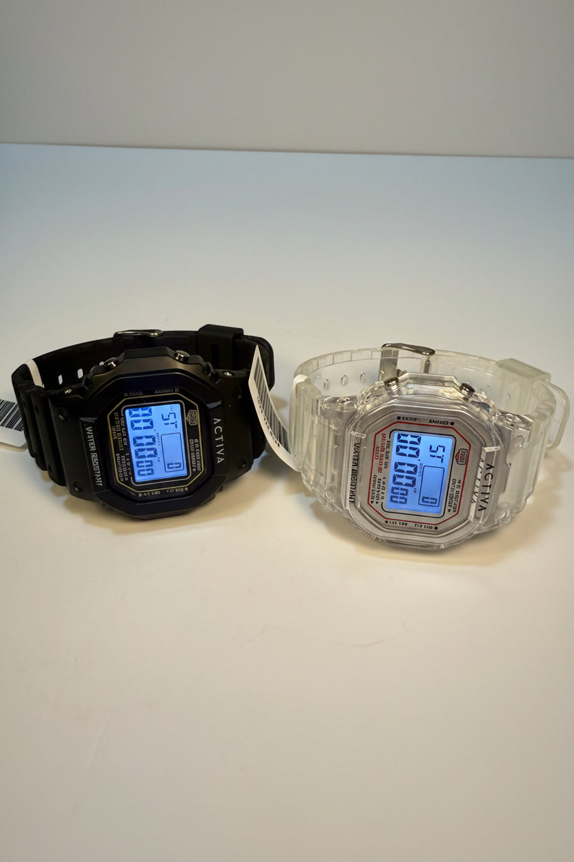 Activa ebony and Ivory Bundle Two digital watches, one black and one transparent, on a white surface with Invicta branding in the background.