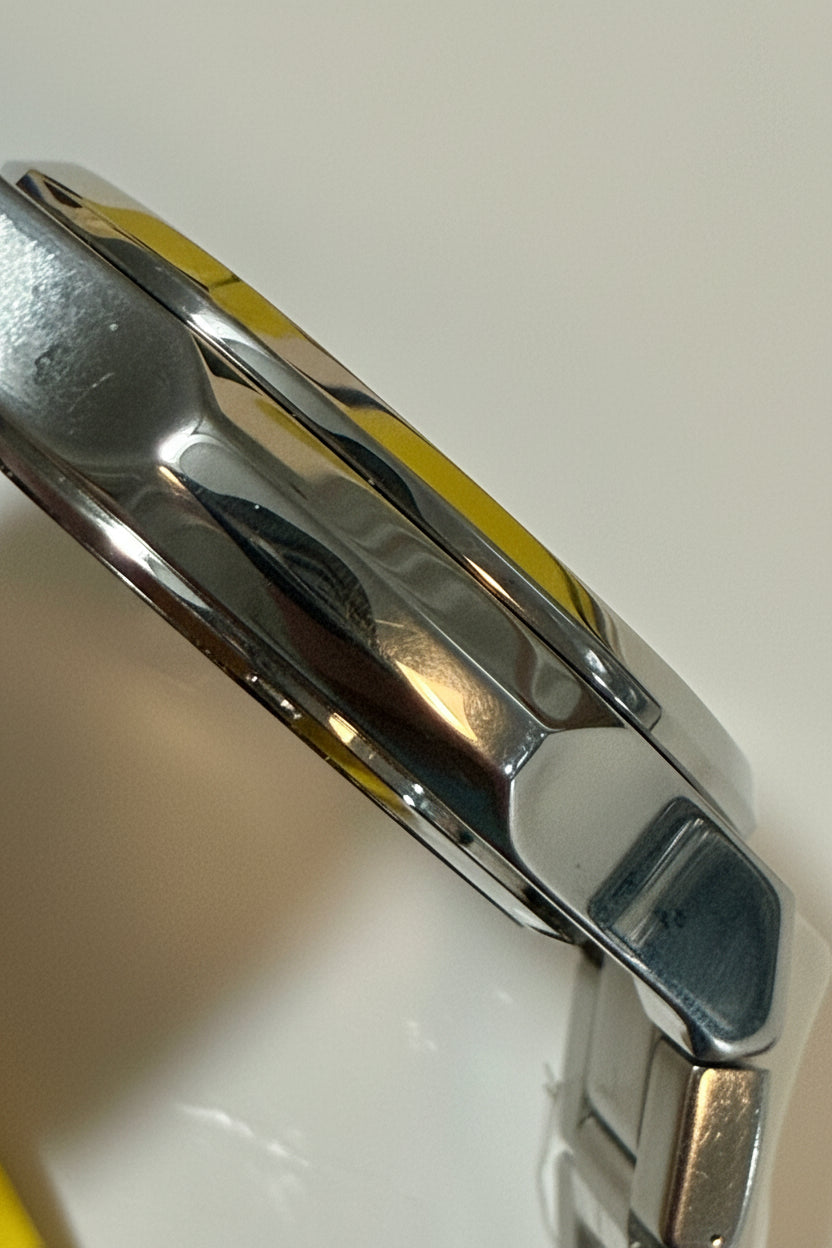 Close-up of a Invicta Speedway Vantage Men's Watch - 43mm. Steel with a reflective surface on a white background