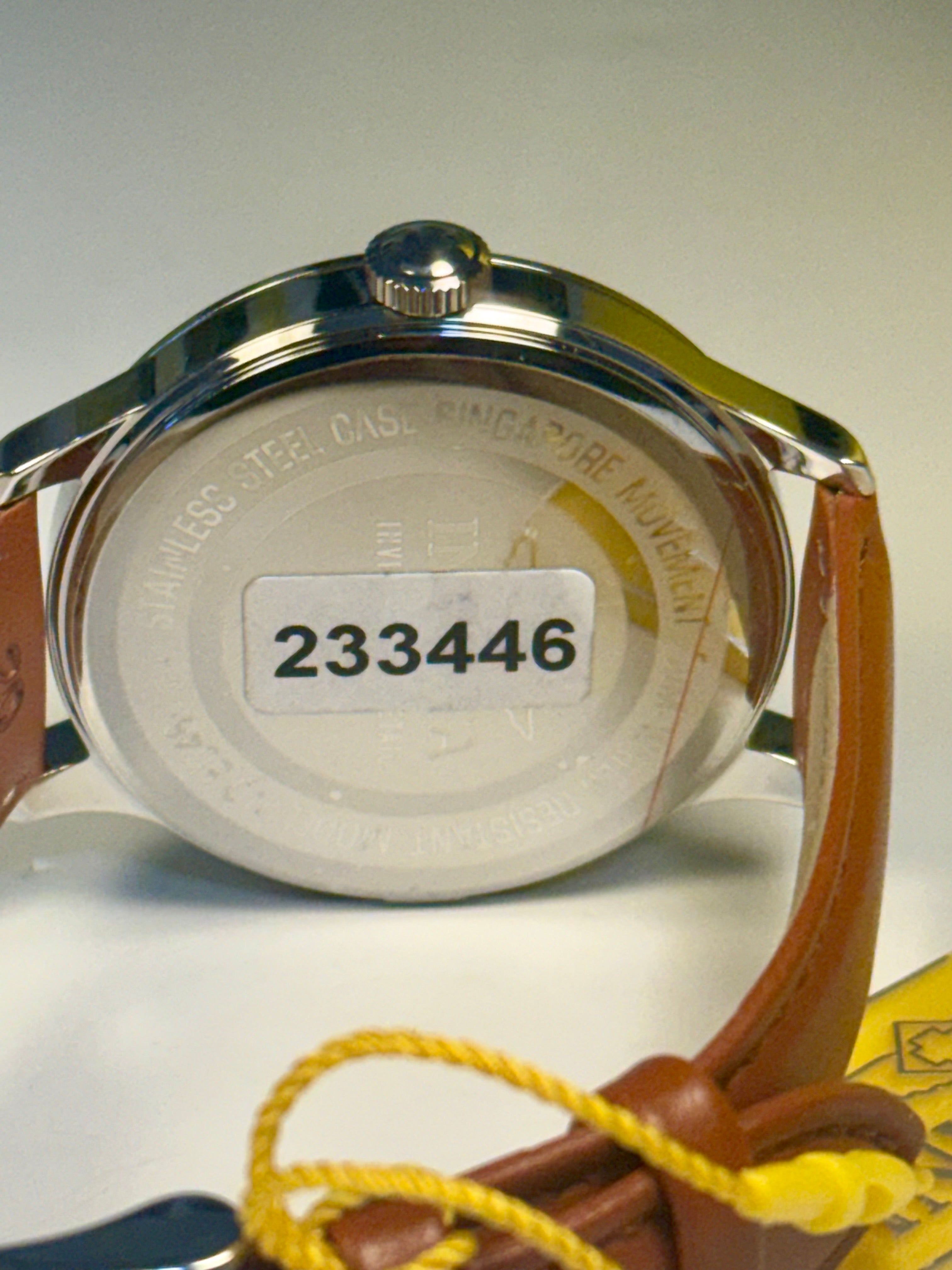 Mens Celestial Blue Sunray Dial Watch with a visible serial number on a white background
