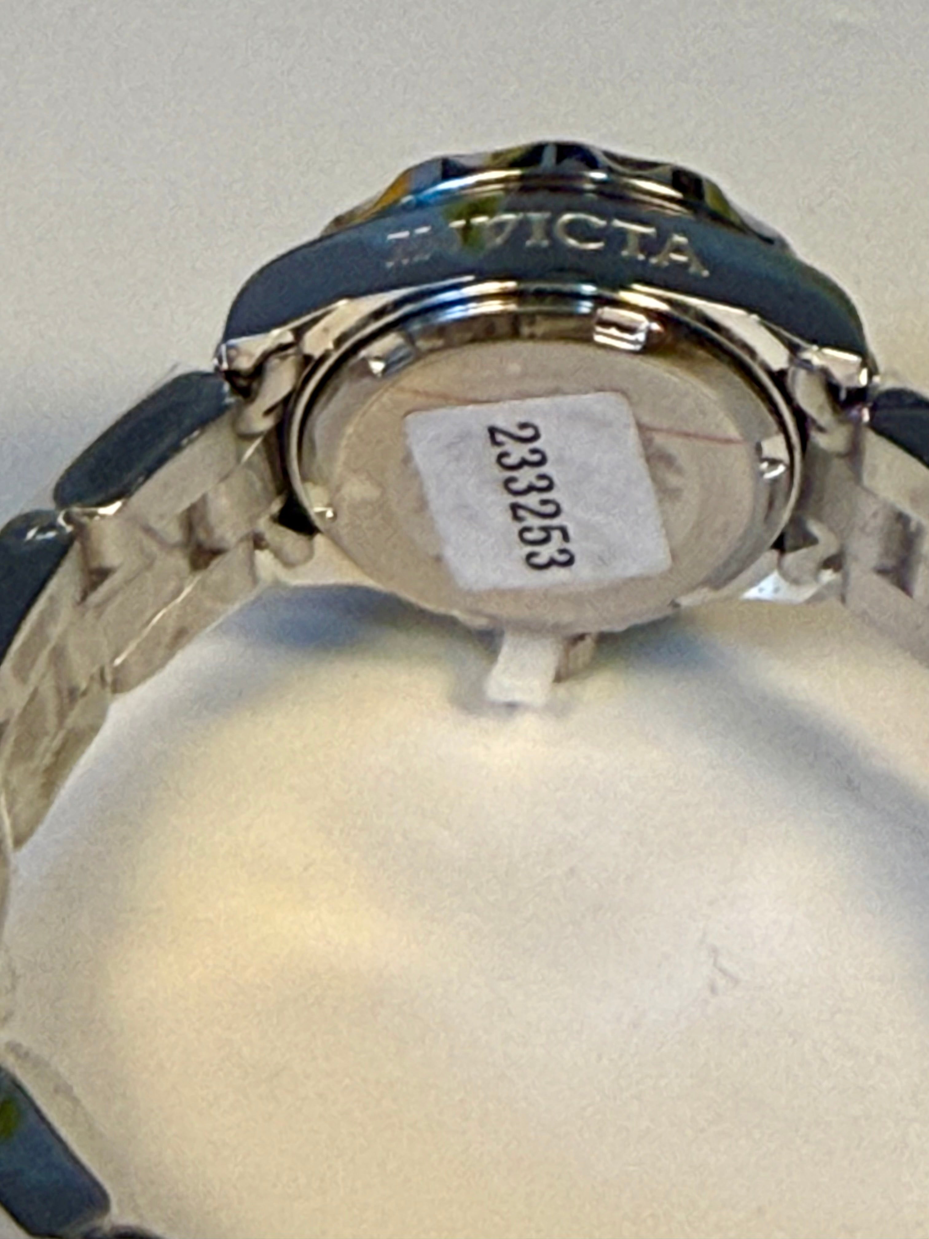 Back view of a Ladies Pro Diver  watch with a visible model number on a light gray background