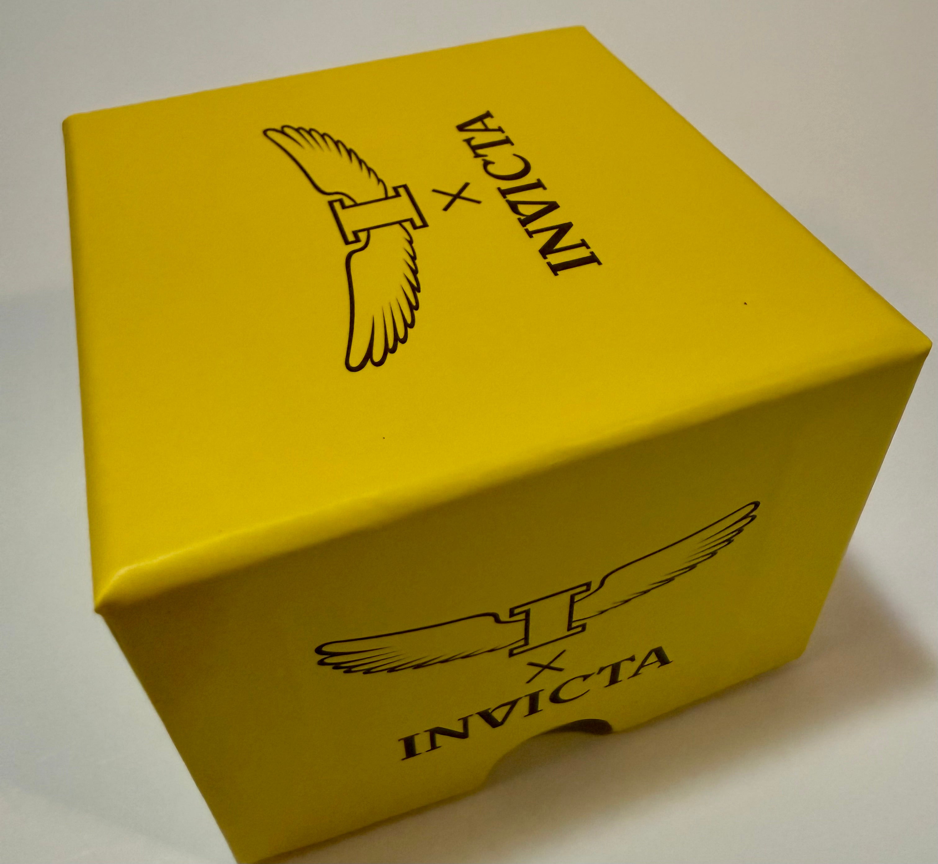 Yellow box with Invicta logo on a white background