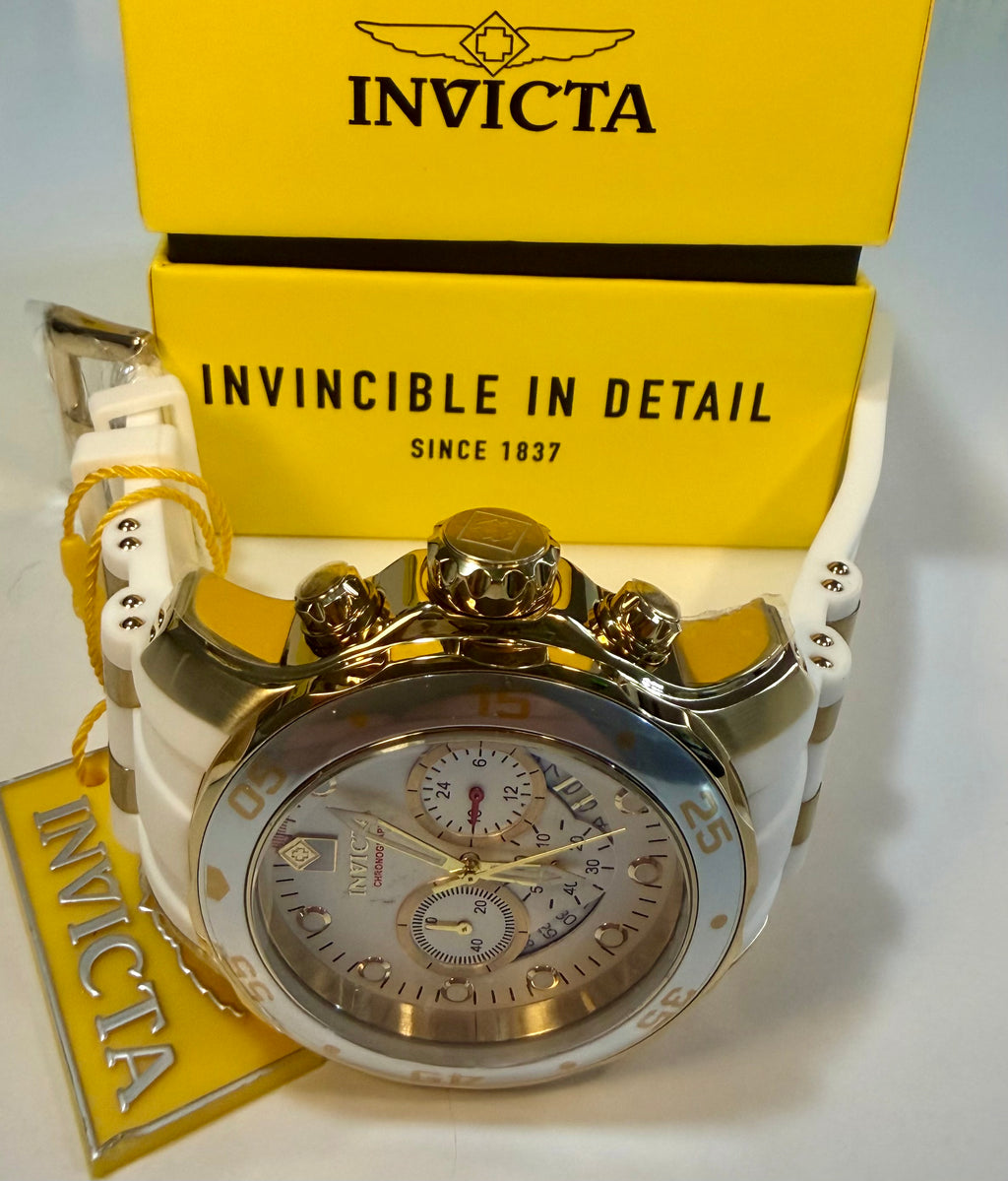 Invicta Scuba 48mm watch with gold accents on a white background