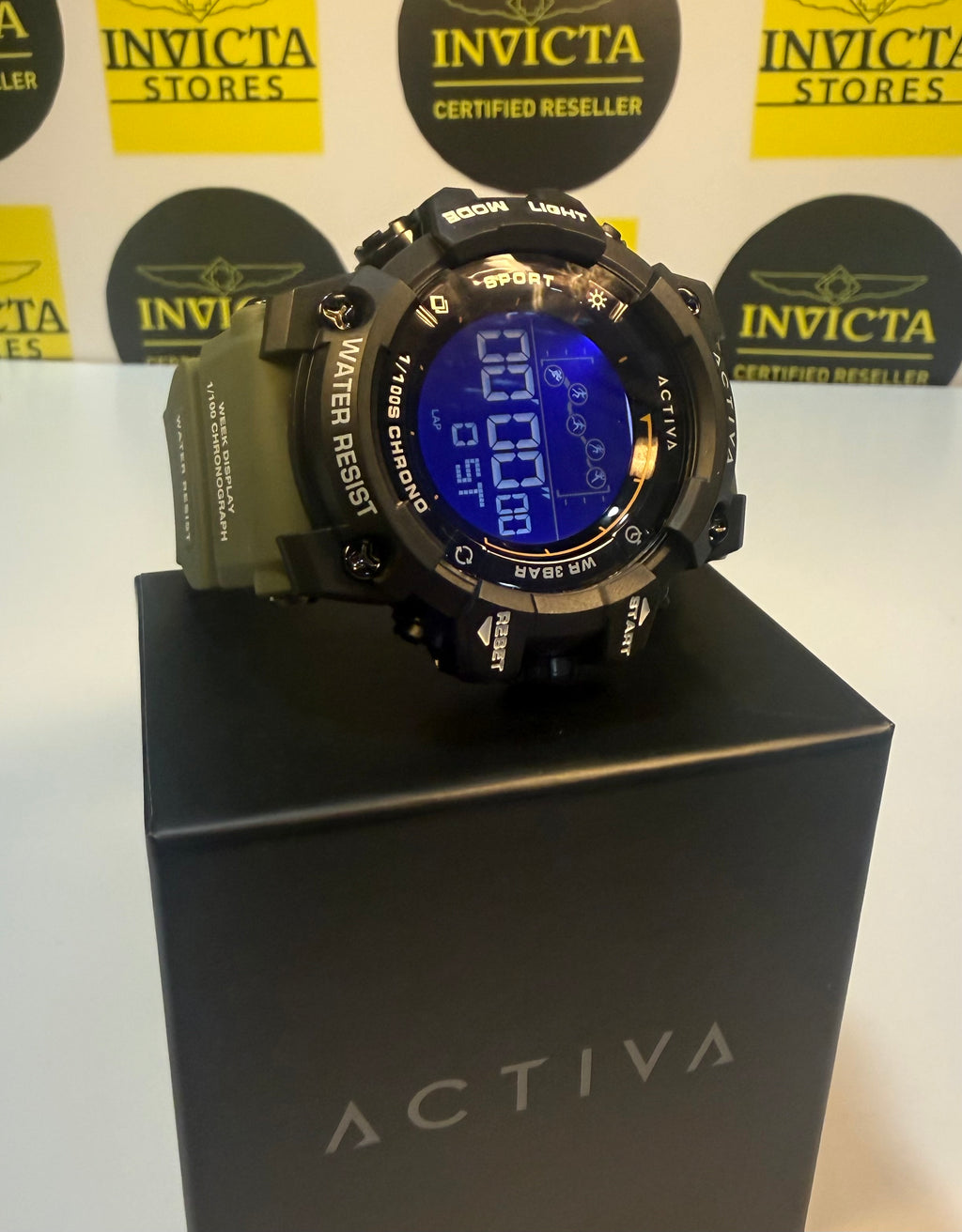 Activa X by Invicta watch on a black stand with Invicta branded background