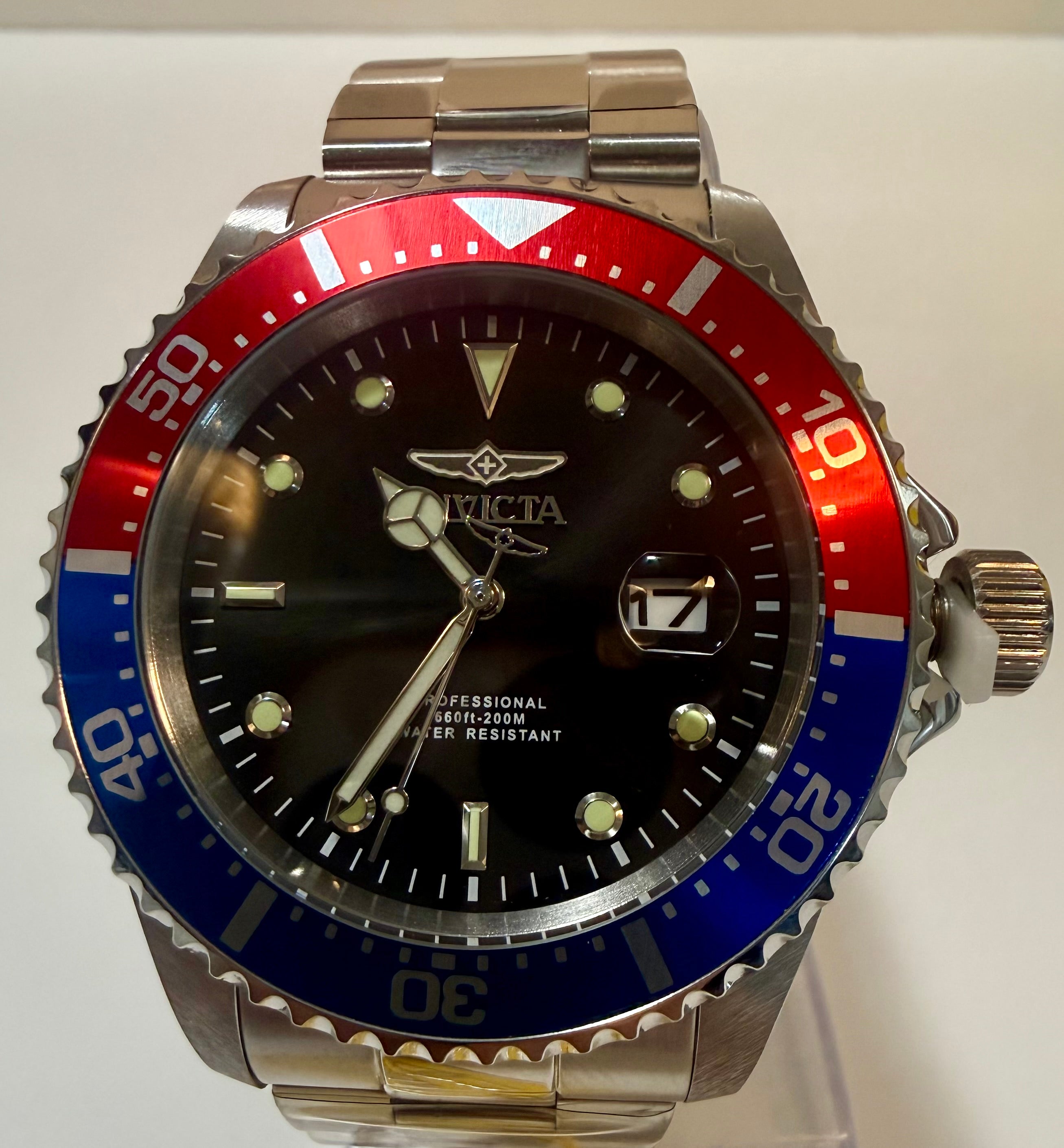 Invicta Pro Diver 23384 Men 43mm Quartz Black Dial Pepsi Blue Red on a white background