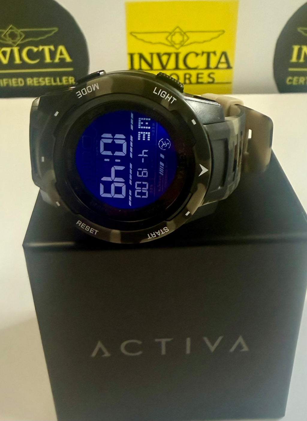 Activa Voyager Camo watch on a black box with Invicta branding in the background