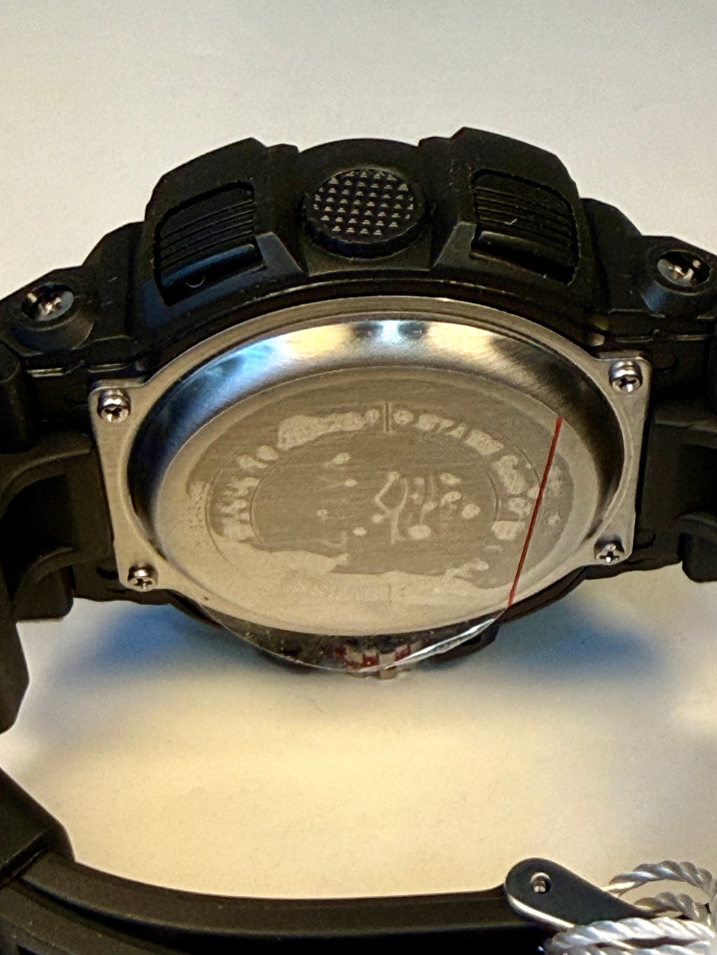 Close-up of a  Invicta Activa Vord X with metallic back on a white background