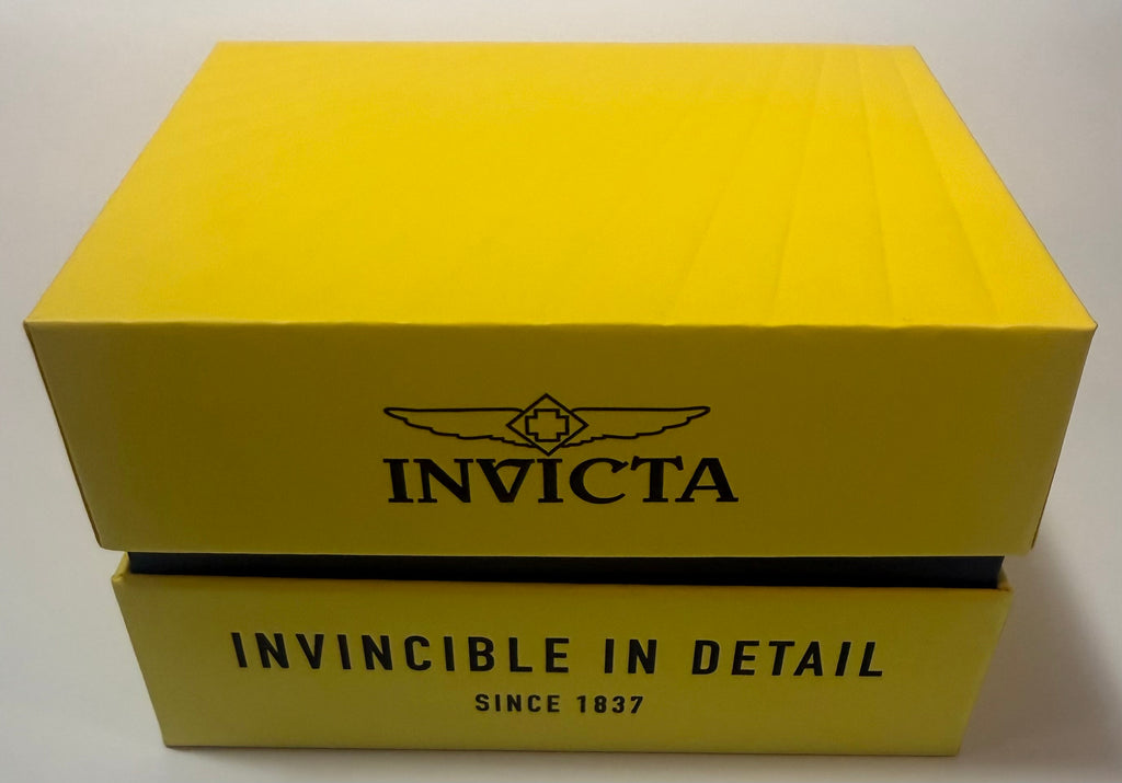 Yellow Invicta box with black text on a white background