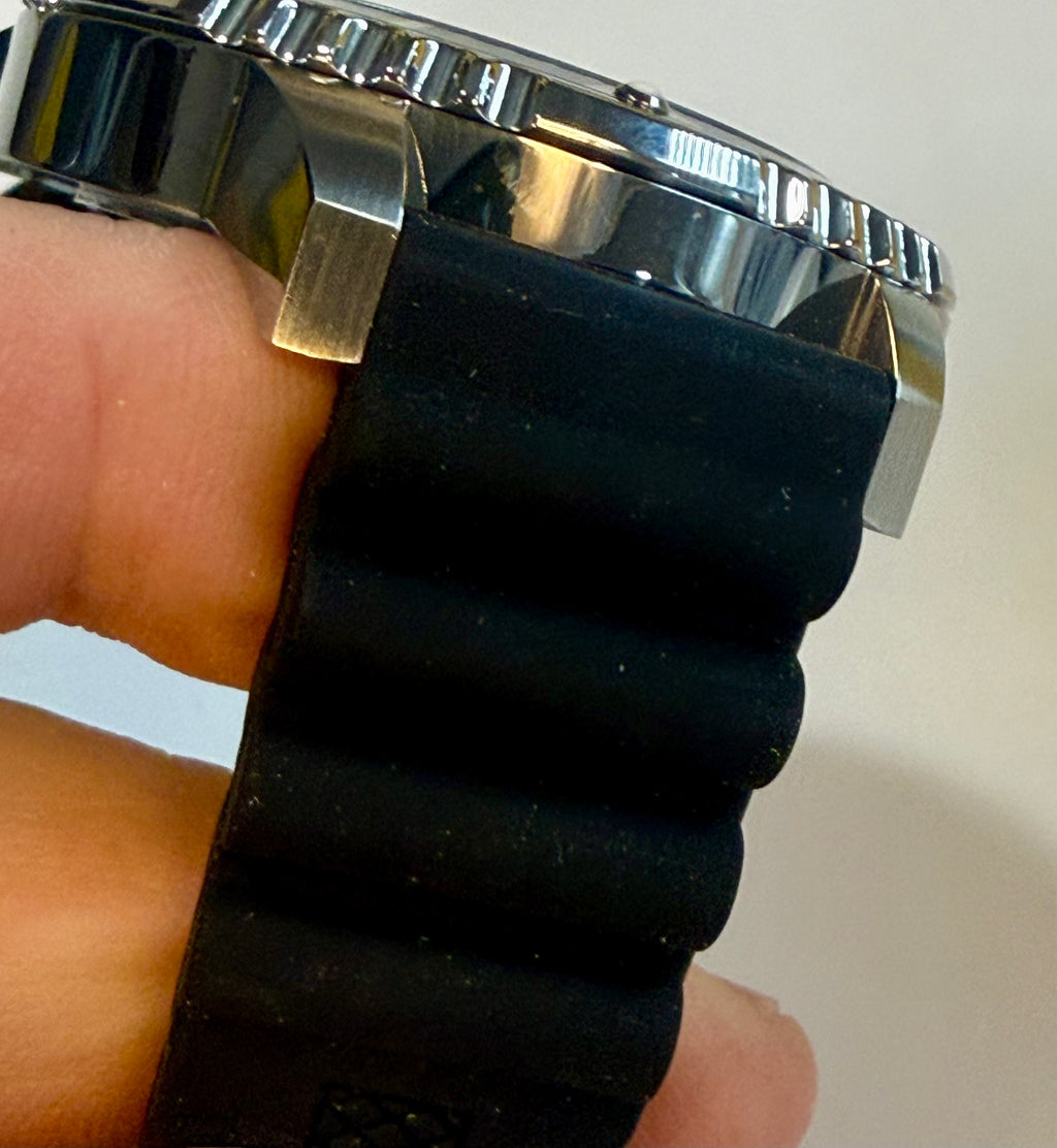 Close-up of a person holding a Invicta Mens Pro Diver 48mm Silicone band 