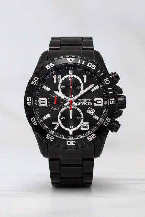 Invicta Mens Specialty Fortitude Black watch with detailed face on a white surface, Invicta box in the background