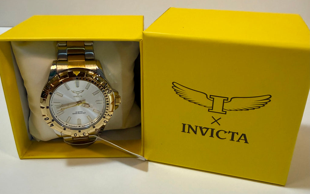 Invicta 69036 Specialty I Men 42mm Two Tone Silver Dial Quartz Bracelet Watchin a yellow Invicta box on a white background
