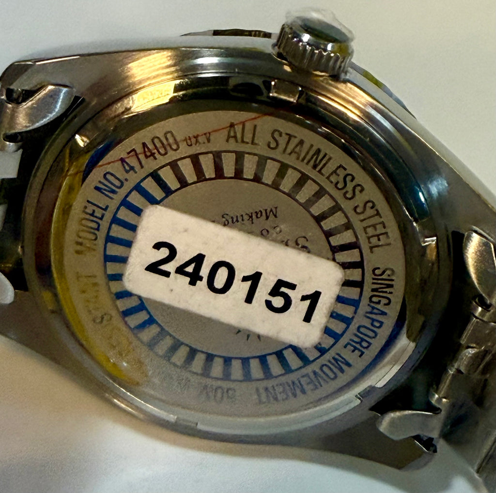 Back of a Invicta Specialty Windsor 43mm with visible branding and model number on a white background