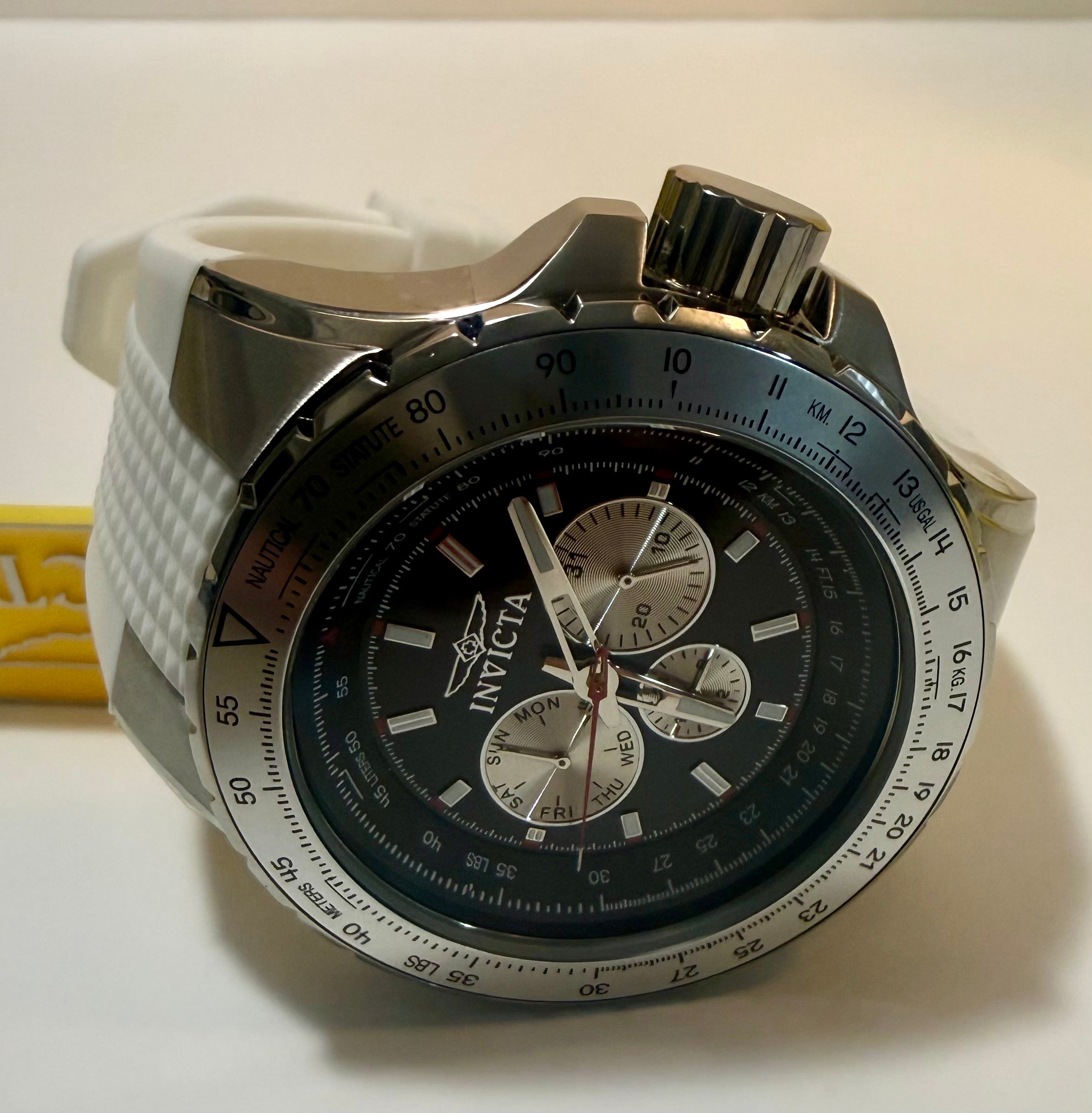 Invicta Aviator  Mens White Silicone Chronograph 50mm with a white strap on a light background