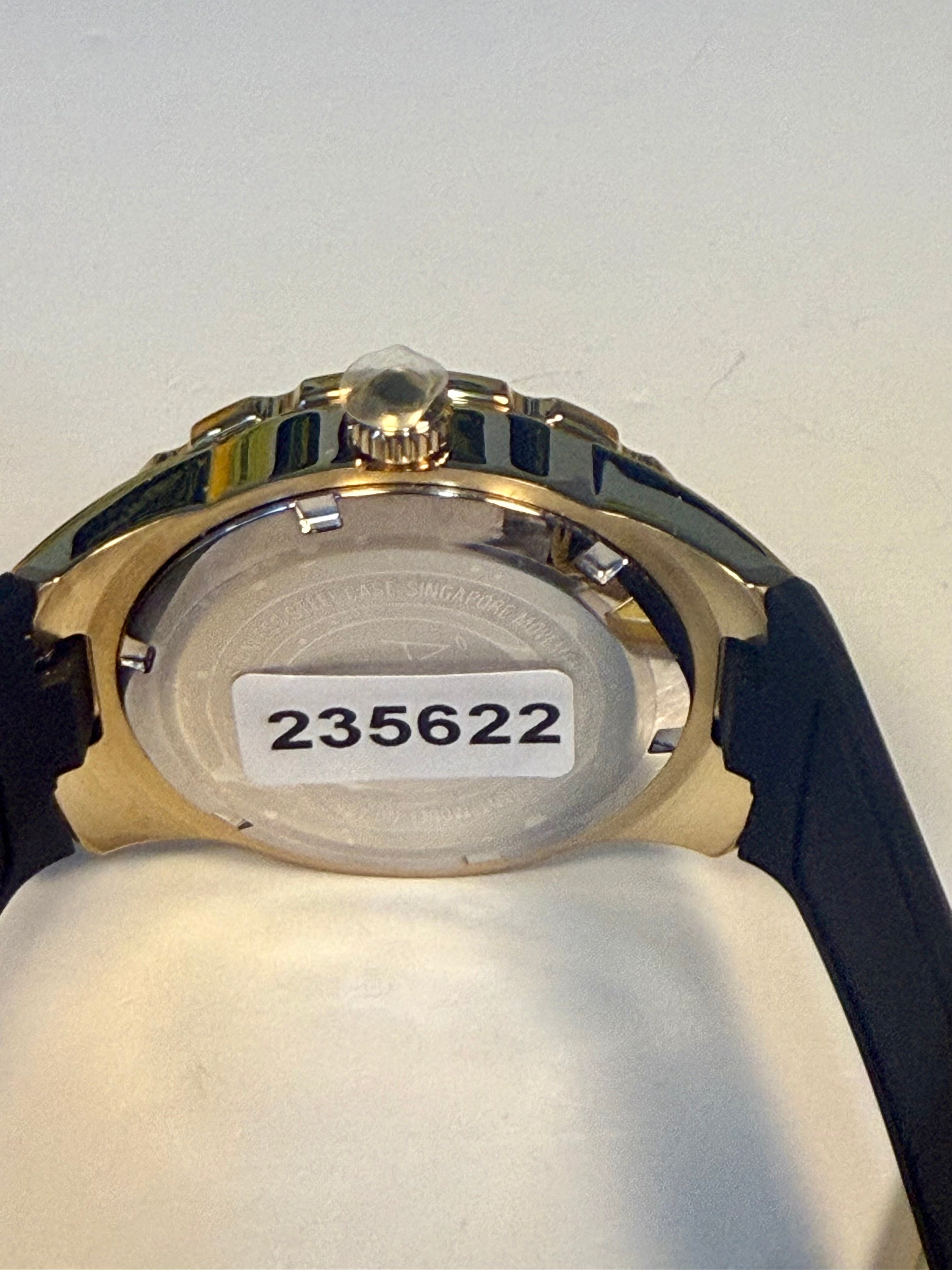 Invicta Ladies Angel Watch case with a visible serial number on a white background