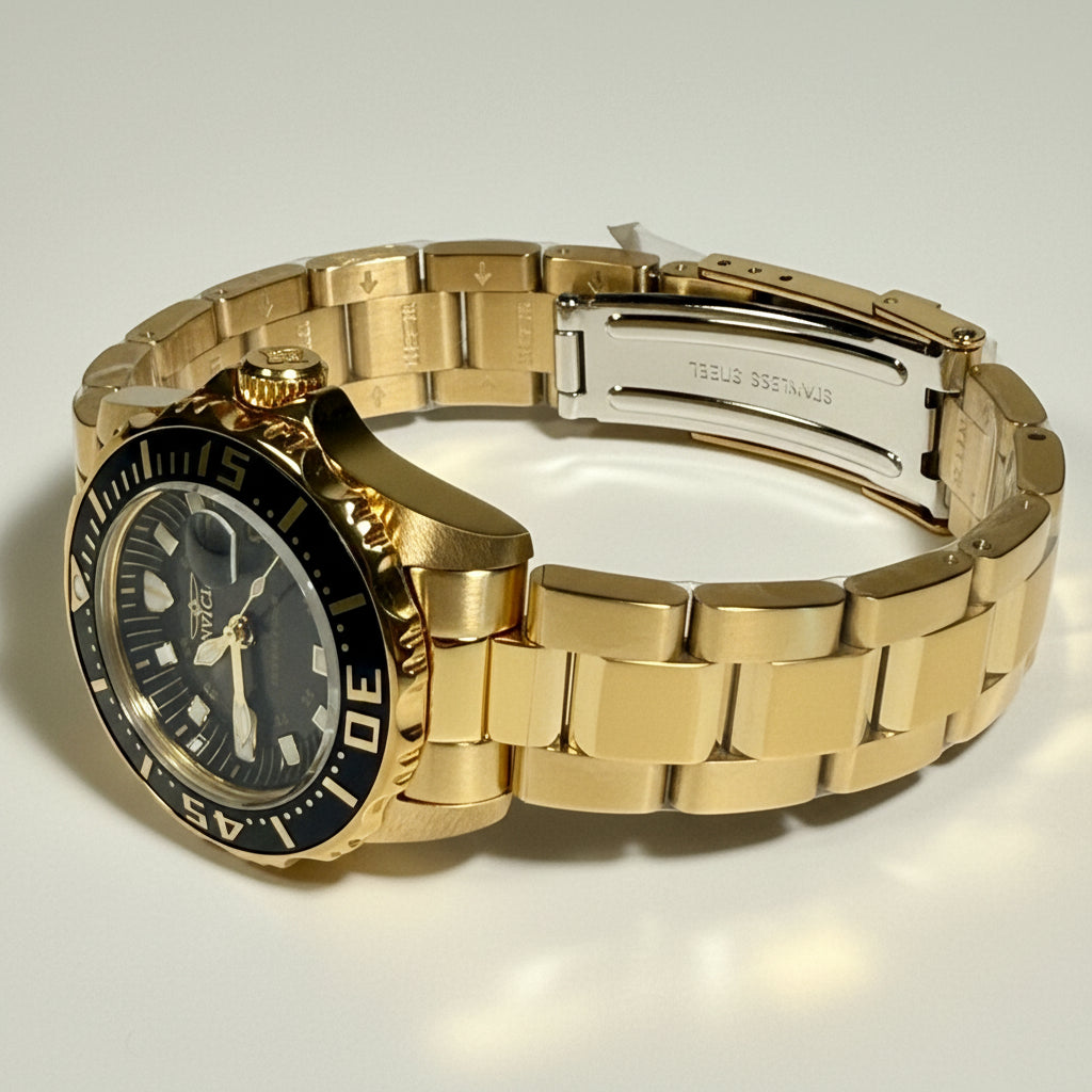 Invicta Pro Diver Swiss Ronda 585 Caliber Women's Watch w/ Mother of Pearl Dial - 30mm, Gold (ZG-2962) lying on a flat surface