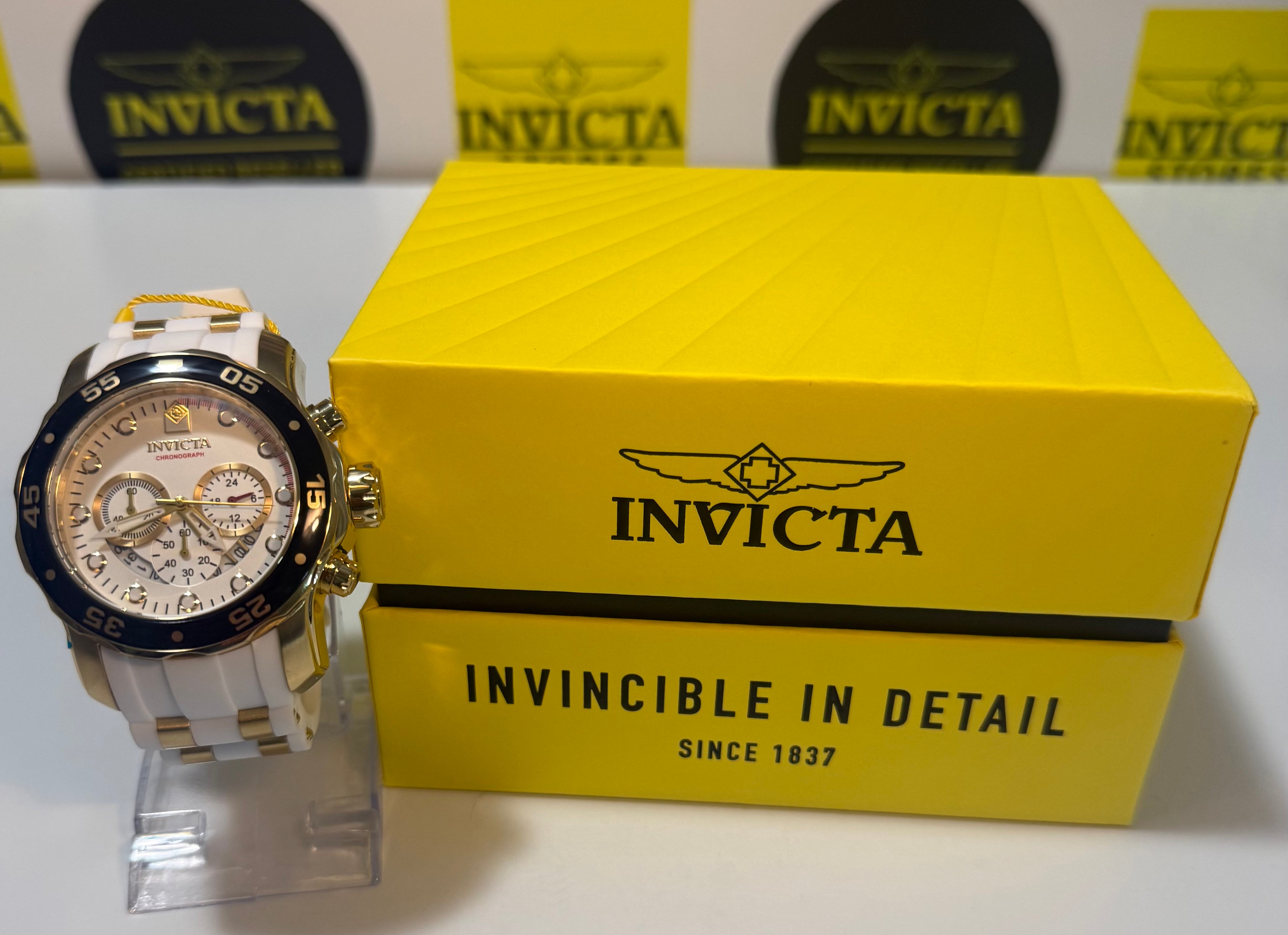 Invicta Pro Diver SCUBA Men's Watch - 48mm. Gold, Whitewith yellow box on a white background