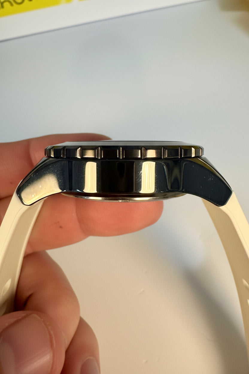 Close-up of aInvicta Aviator Patriotic Camo watch band being adjusted by a hand on a white background