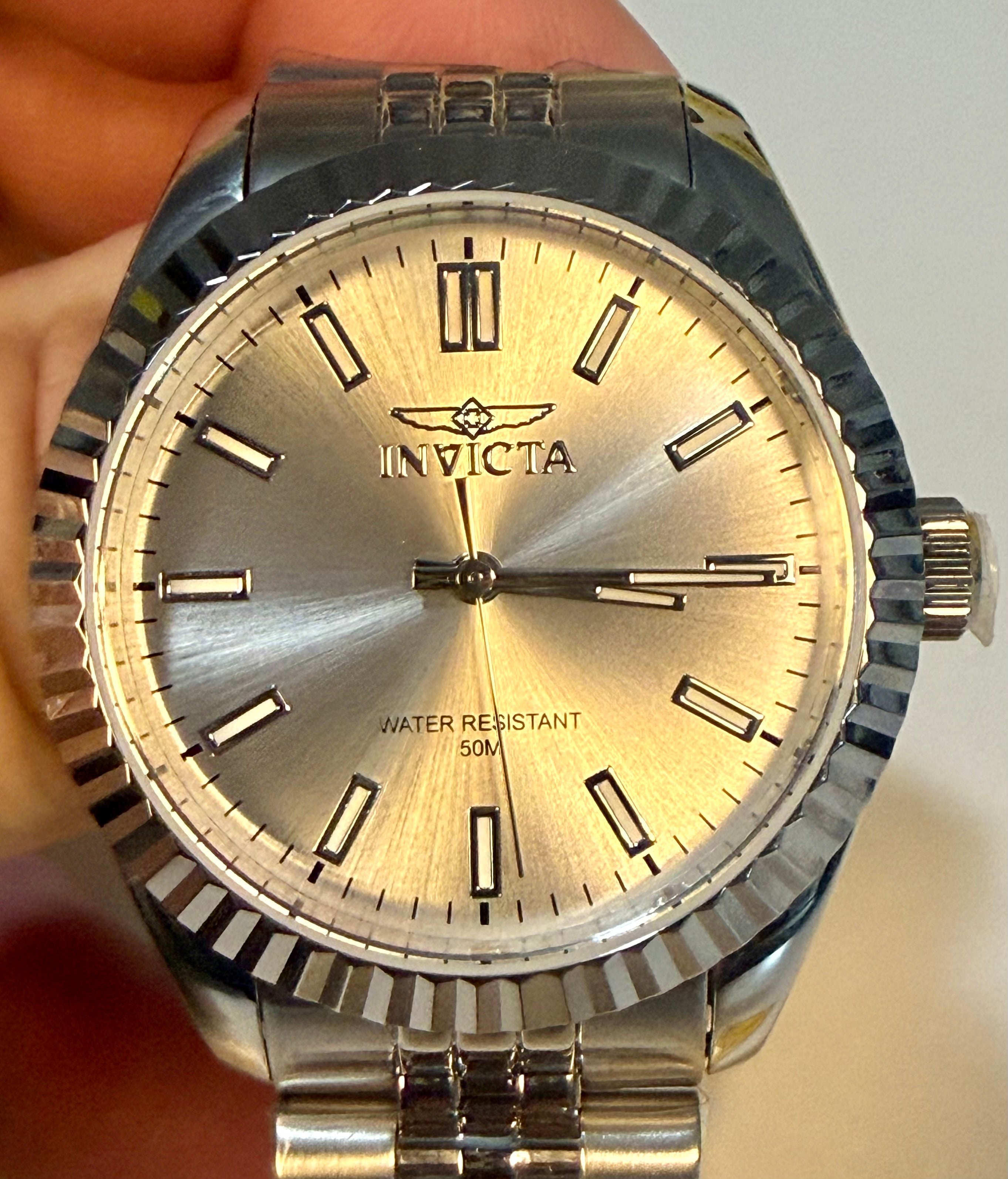 Invicta Ladies Specialty 36mm Silver Invicta watch on a plain background