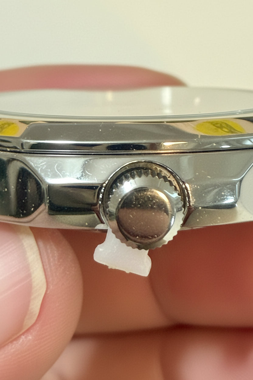 Close-up of aInvicta Speedway Vantage Men's Watch - 43mm. Steel with a clear face, held by a hand.