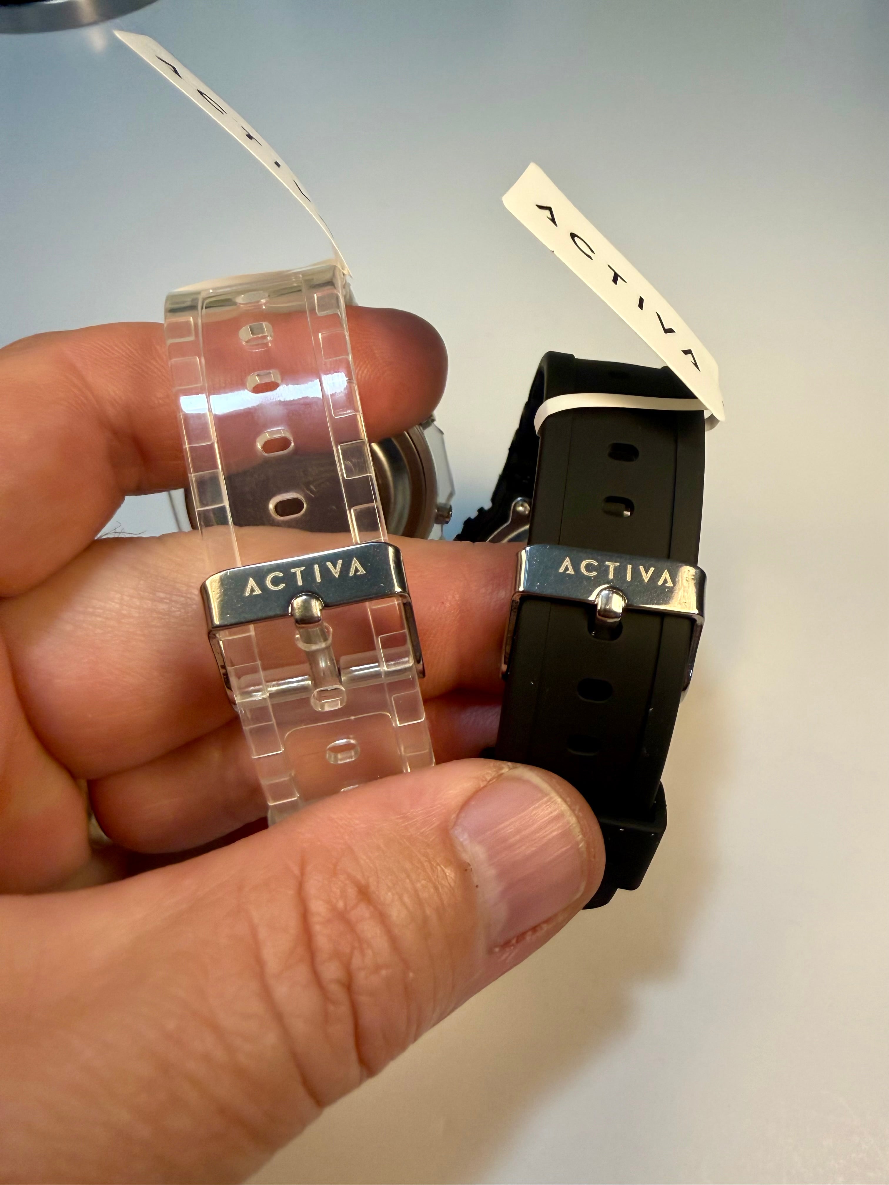 Activa ebony and Ivory Bundle Two watch bands labeled 'Activa' held in a hand against a light background.