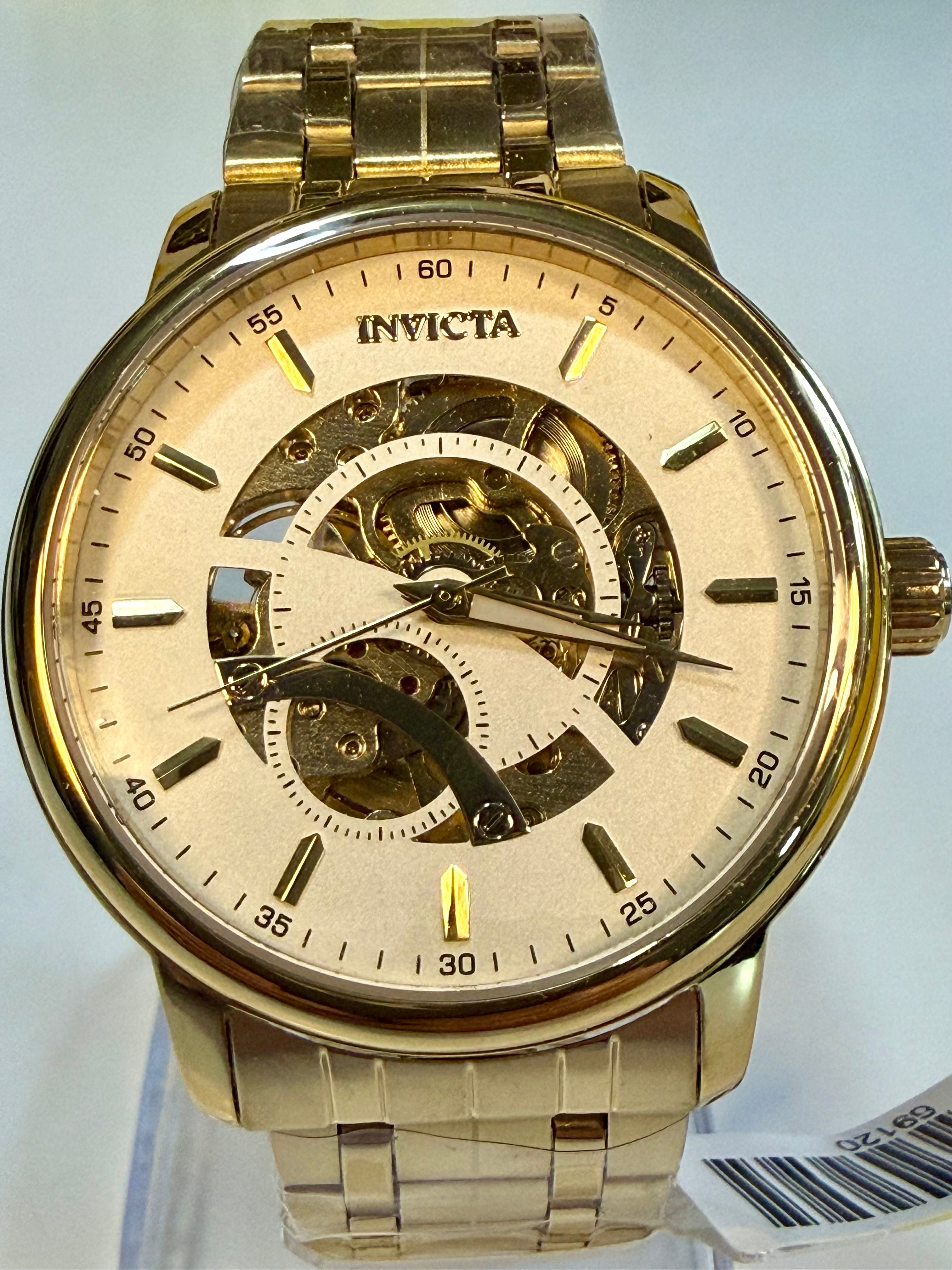 Invicta Mens Automatic Objet' De Art  Gold Invicta watch with a clear background