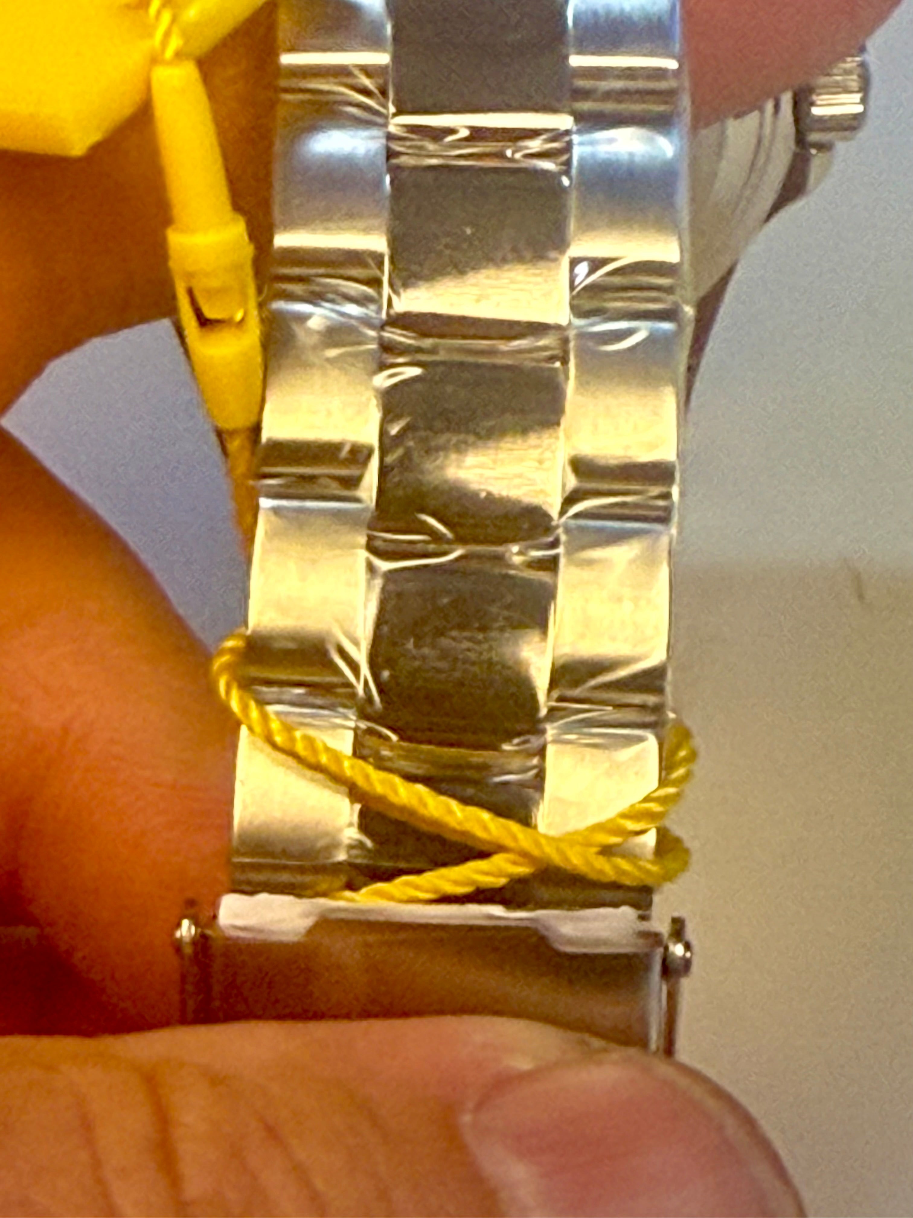 Mens 43mm Pro Diver with a yellow strap on a person's wrist