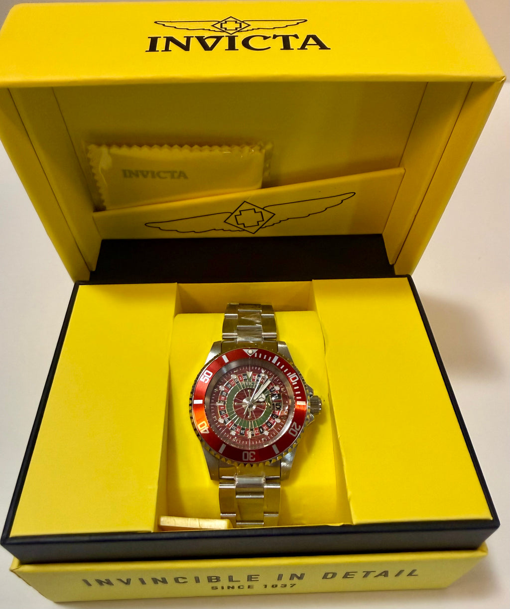 Invicta Pro Diver Roulette House of Cards Men's 40mm  watch in a yellow box with visible branding