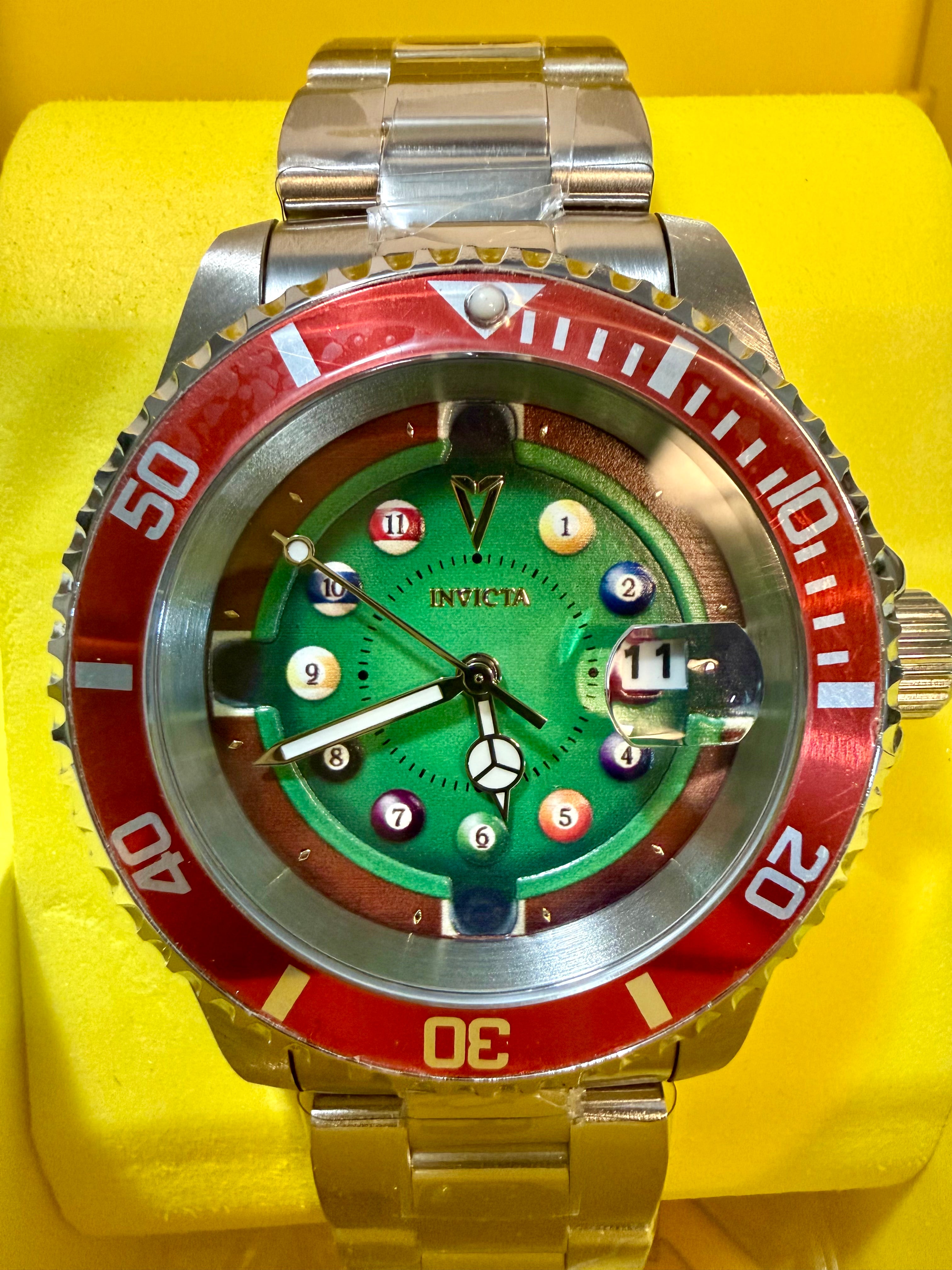Invicta Pro Diver House of Cards Men's Watch - 40mm. Watch with a green face and red and silver accents on a yellow background
