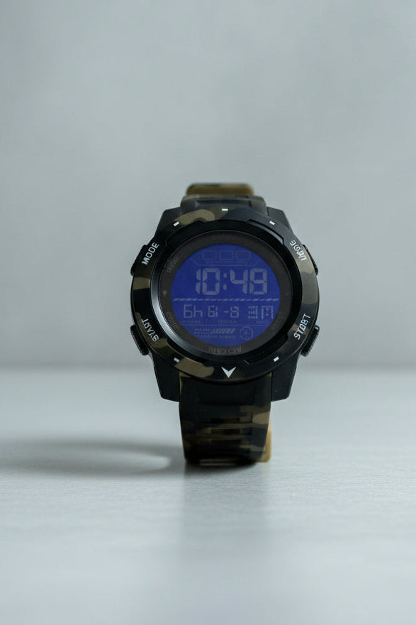 Activa Voyager Camo Digital watch with camouflage band on a light gray background