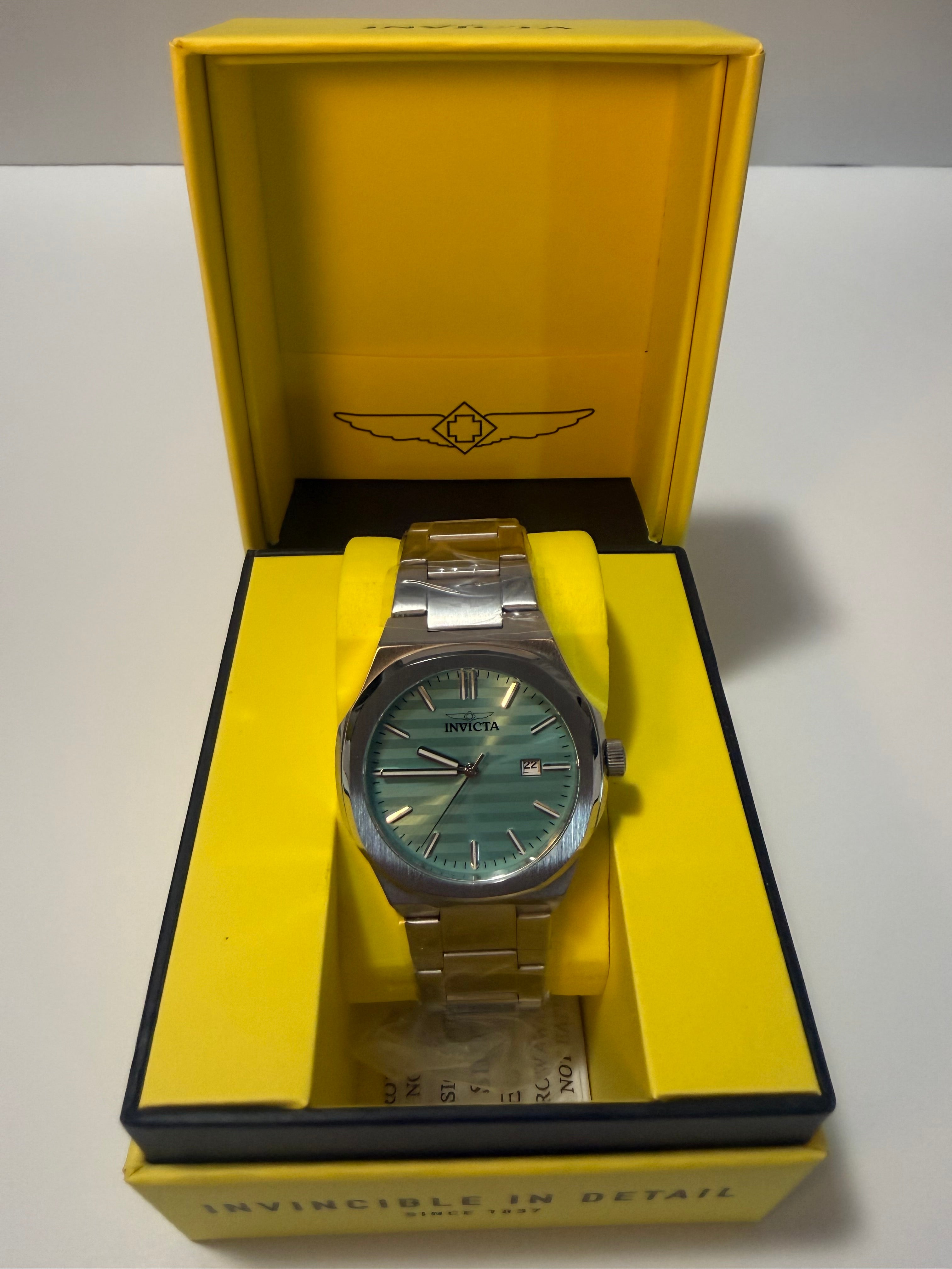 Invicta Speedway Vantage Men's Watch - 43mm. Steel in a yellow box on a white background
