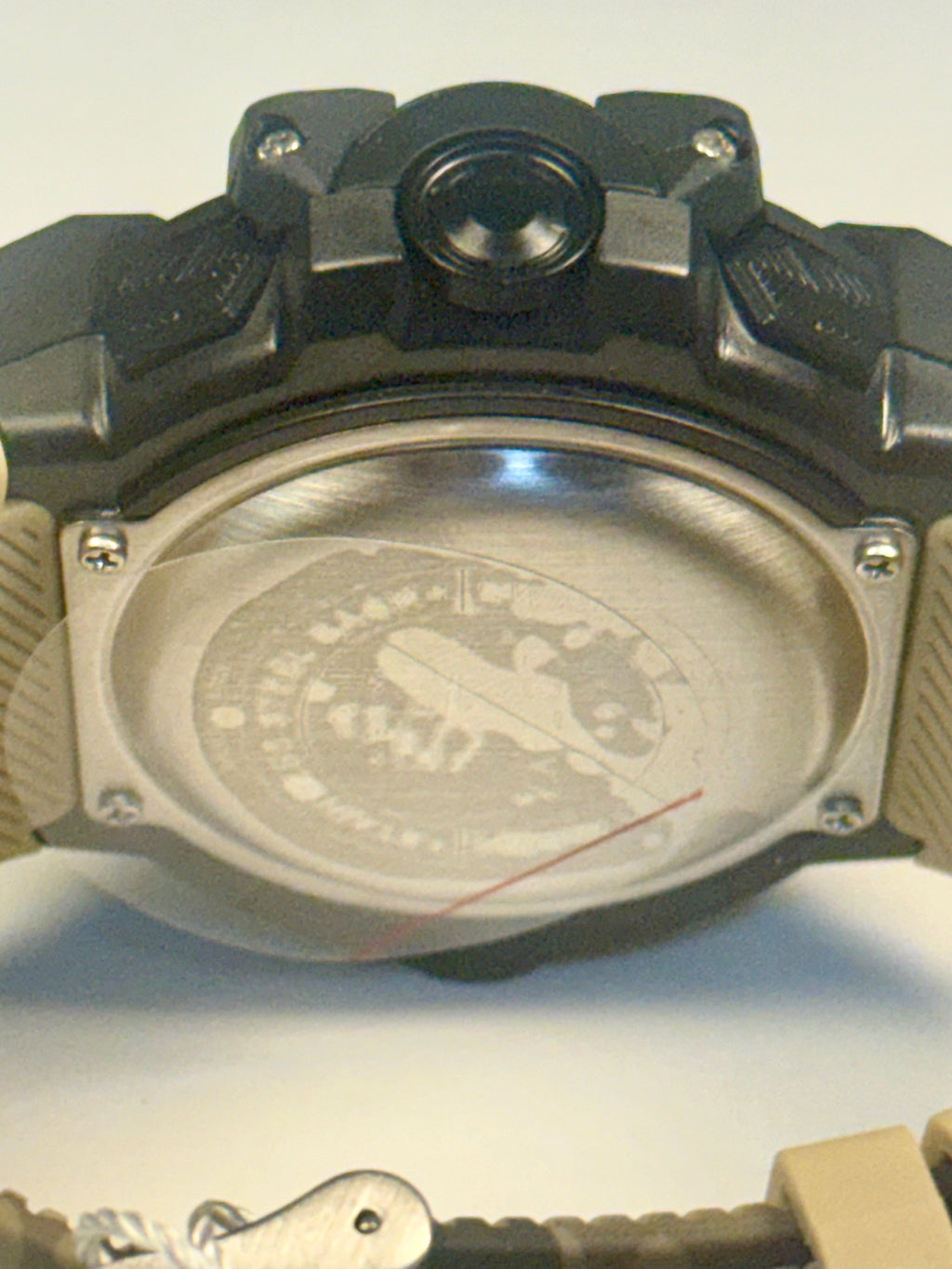 Activa Camo Sport Watch Close-up of a watch case with branding on a light gray background