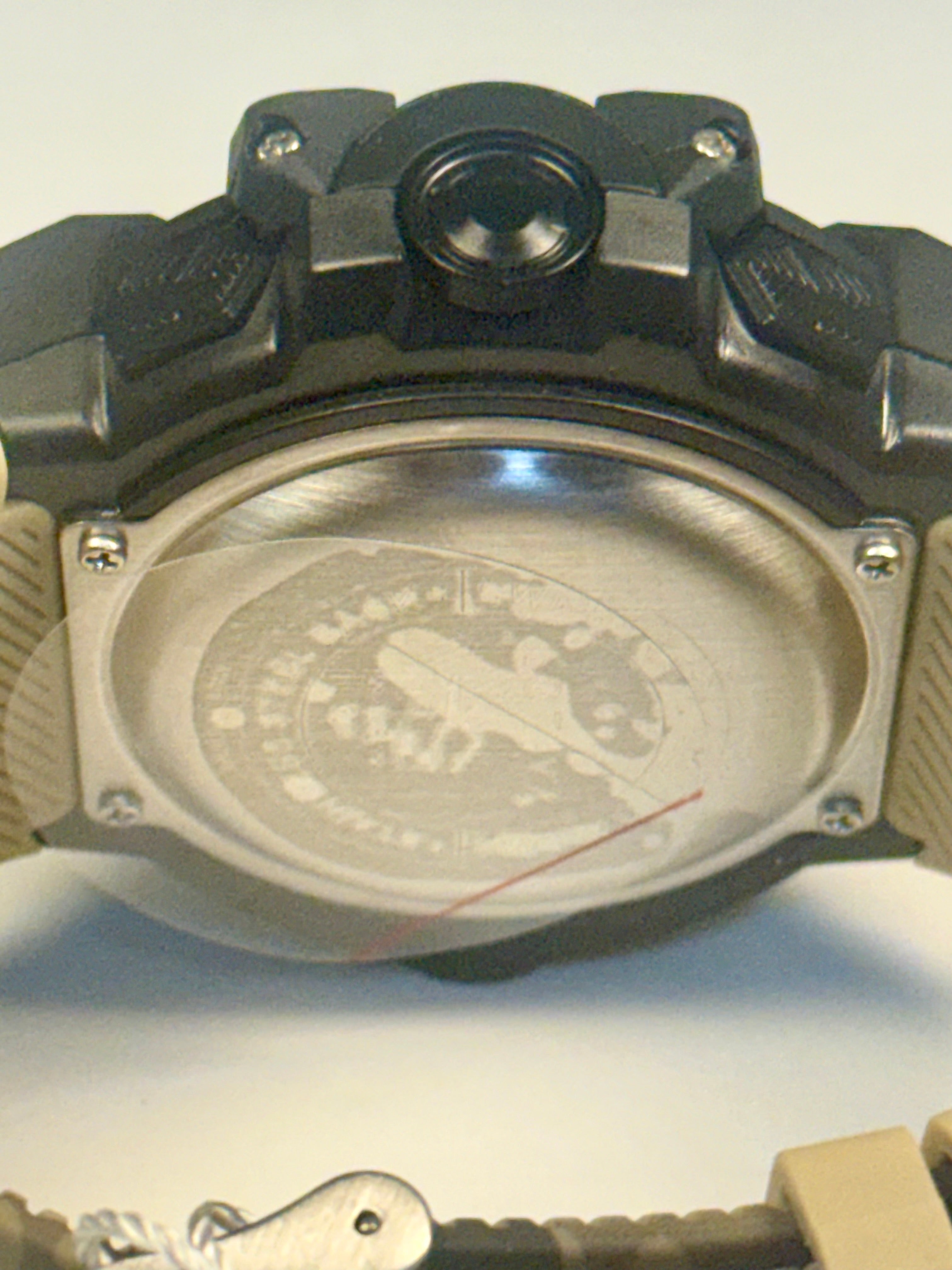 Activa Camo Sport Watch Close-up of a watch case with branding on a light gray background
