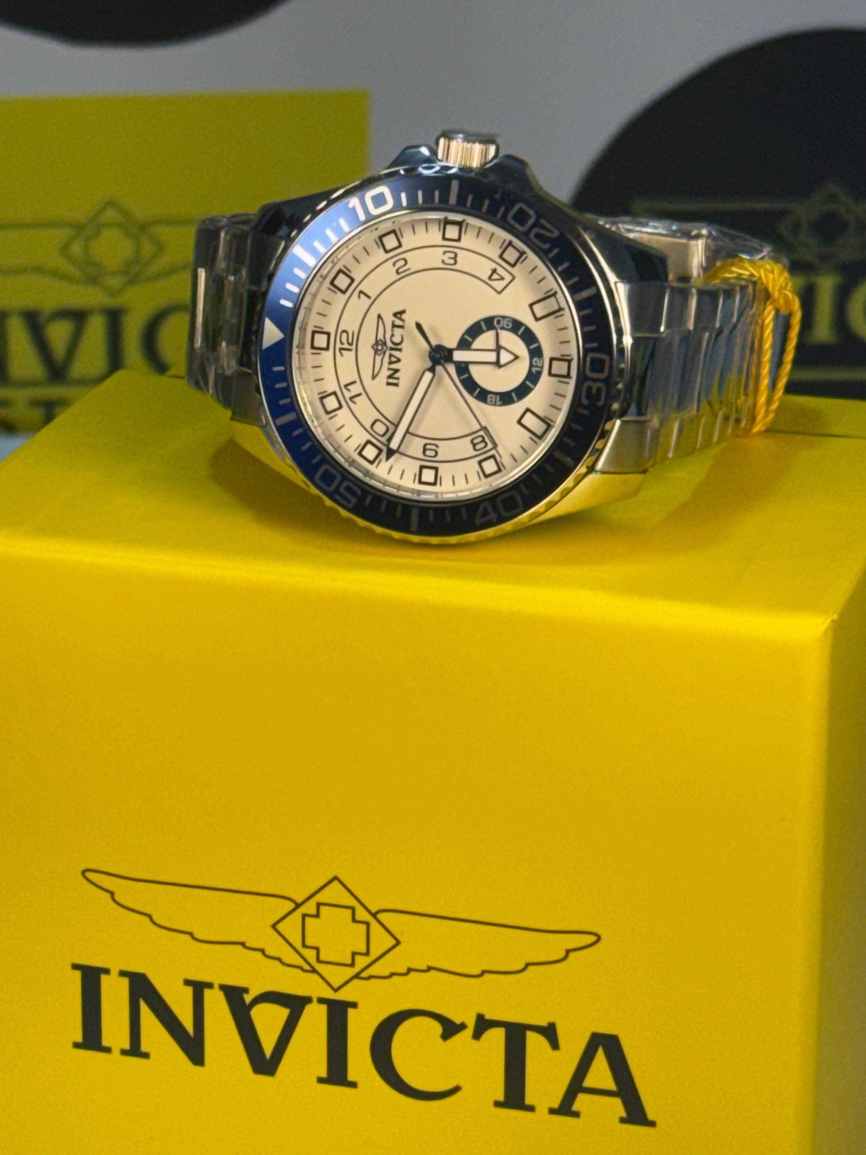 Invicta Mens Pro Diver Watch on a yellow Invicta box