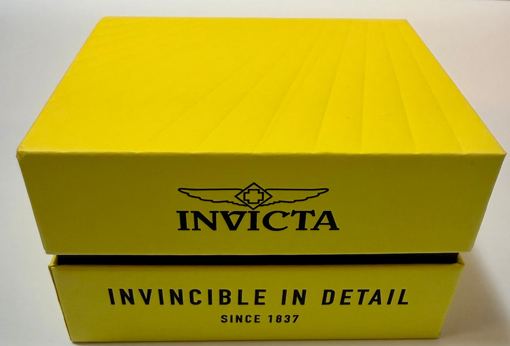 Yellow Invicta watch box with black text on a white background