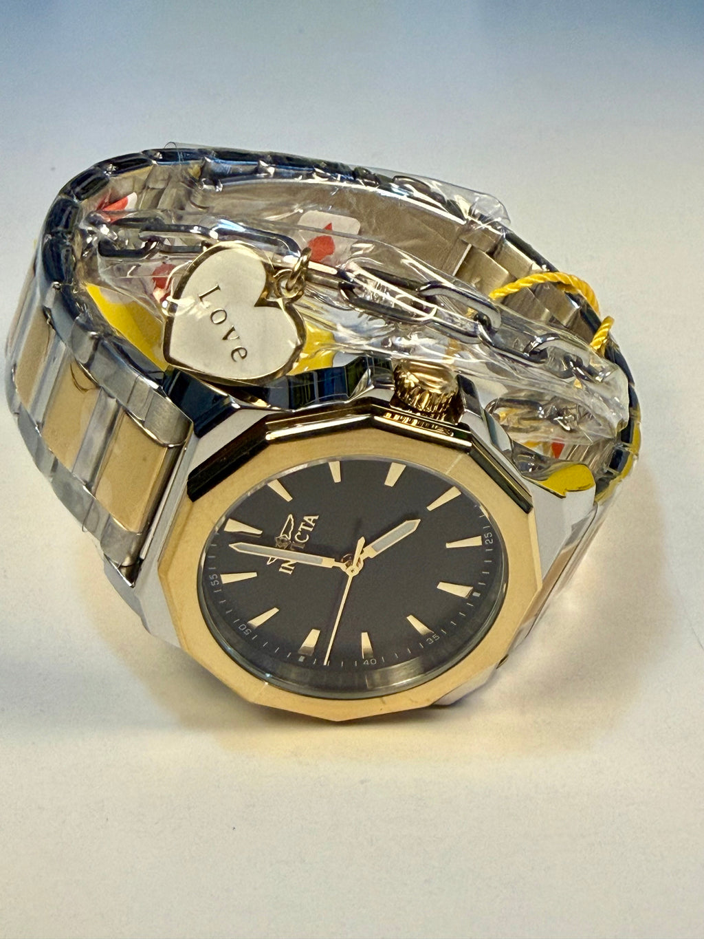Speedway Ladies 34mm ComboGold and silver watch with a clear face on a light gray background