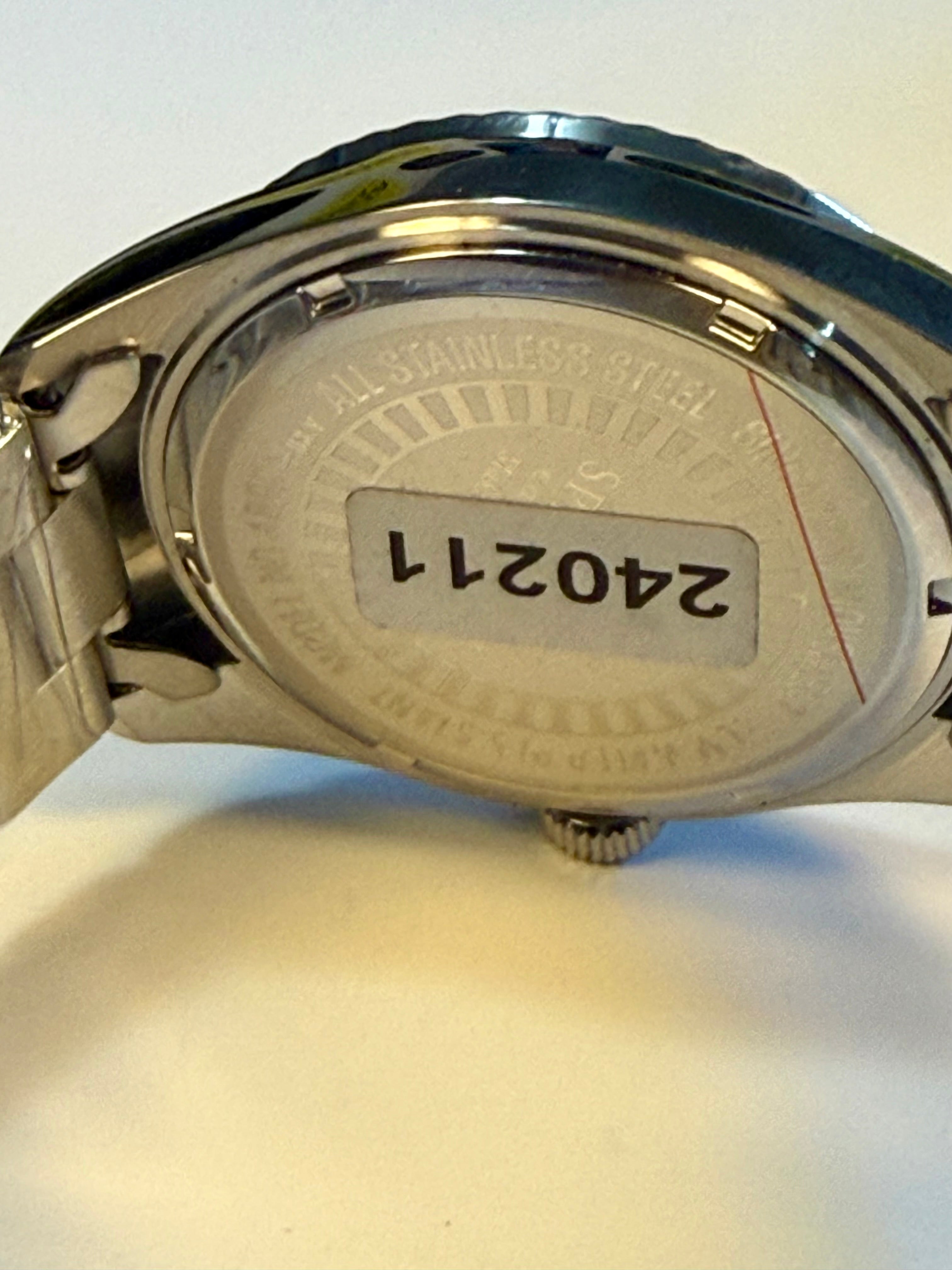 Back view of a Invicta Specialty Stratford watch with a visible serial number on a white background