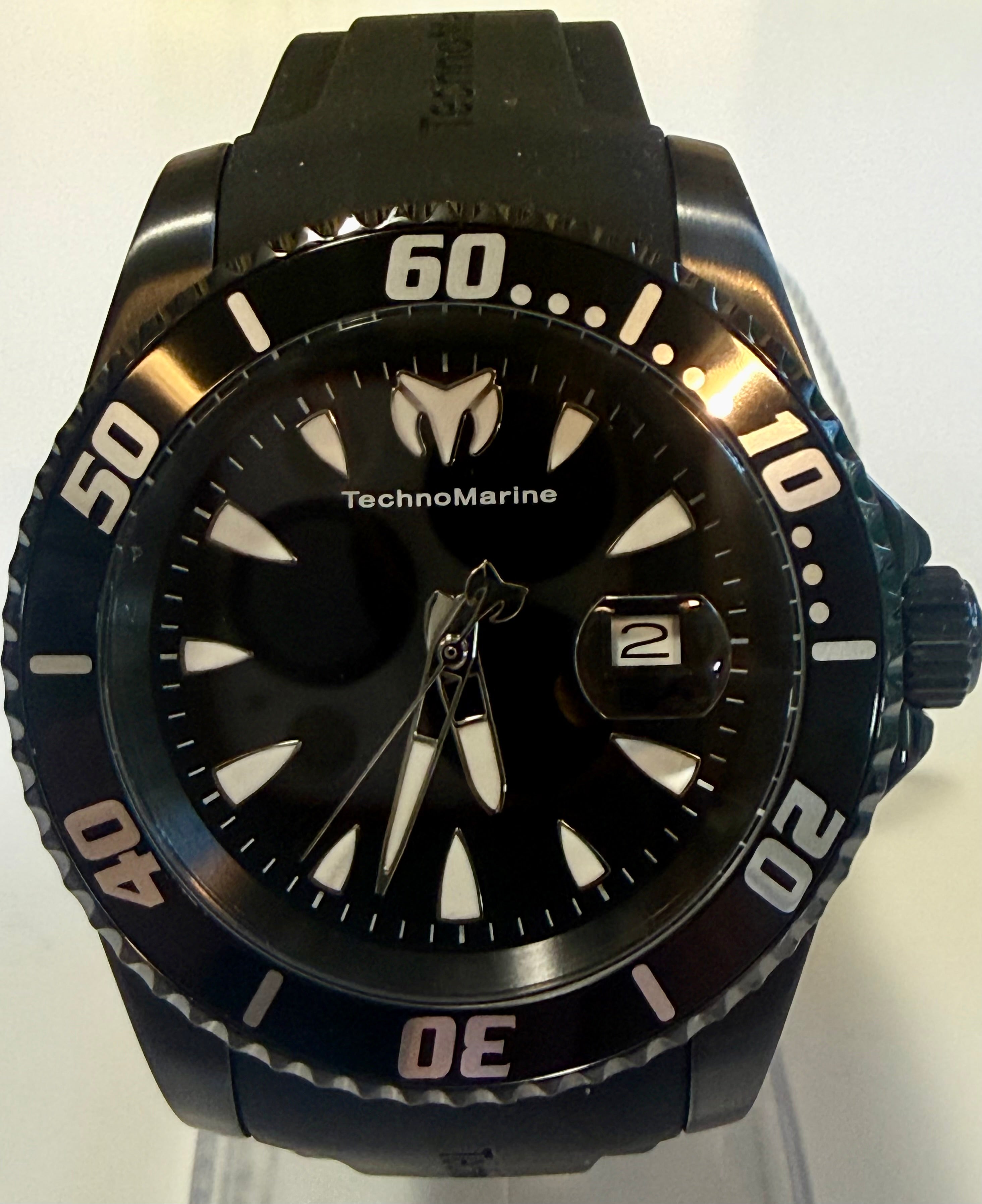 TechnoMarine 42mm Trible Black Manta Sea watch with a white face on a white background