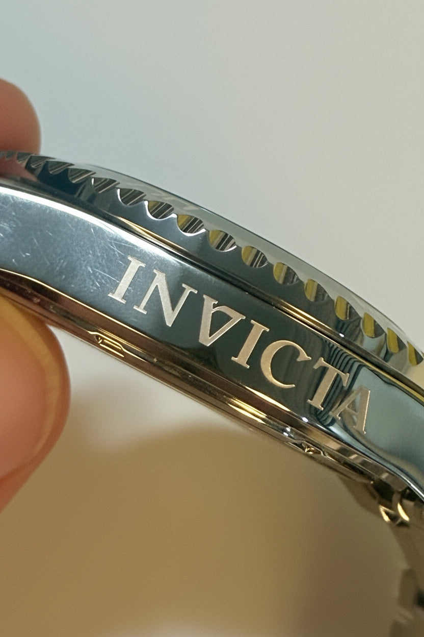 Close-up of aInvicta Mens Pro Diver 43mm   silver I watch band with a blurred background